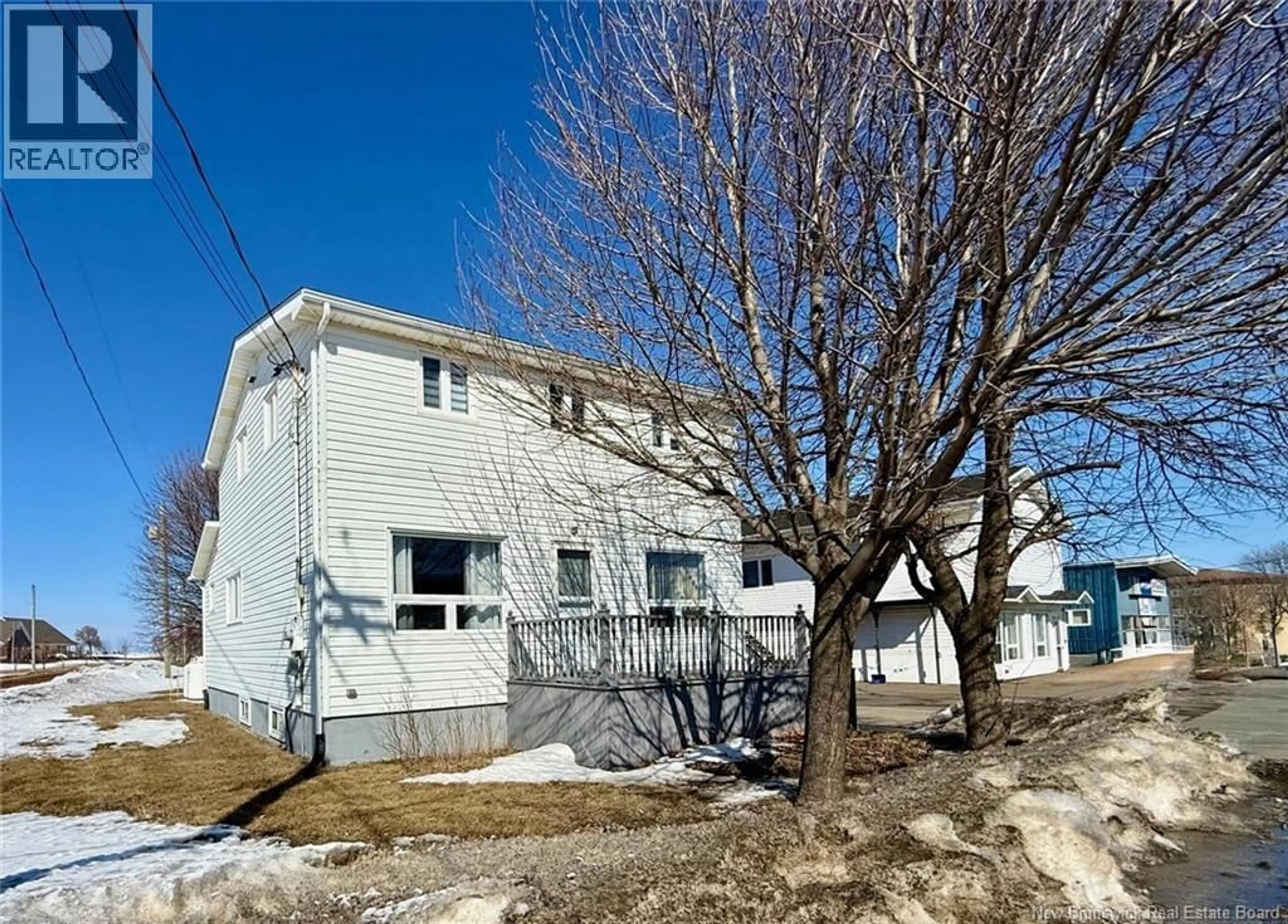 A pic from outside/outdoor area/front of a property/back of a property/a pic from drone, street for 148-150 BOUL. J.D. GAUTHIER, Shippagan New Brunswick E8S2K9