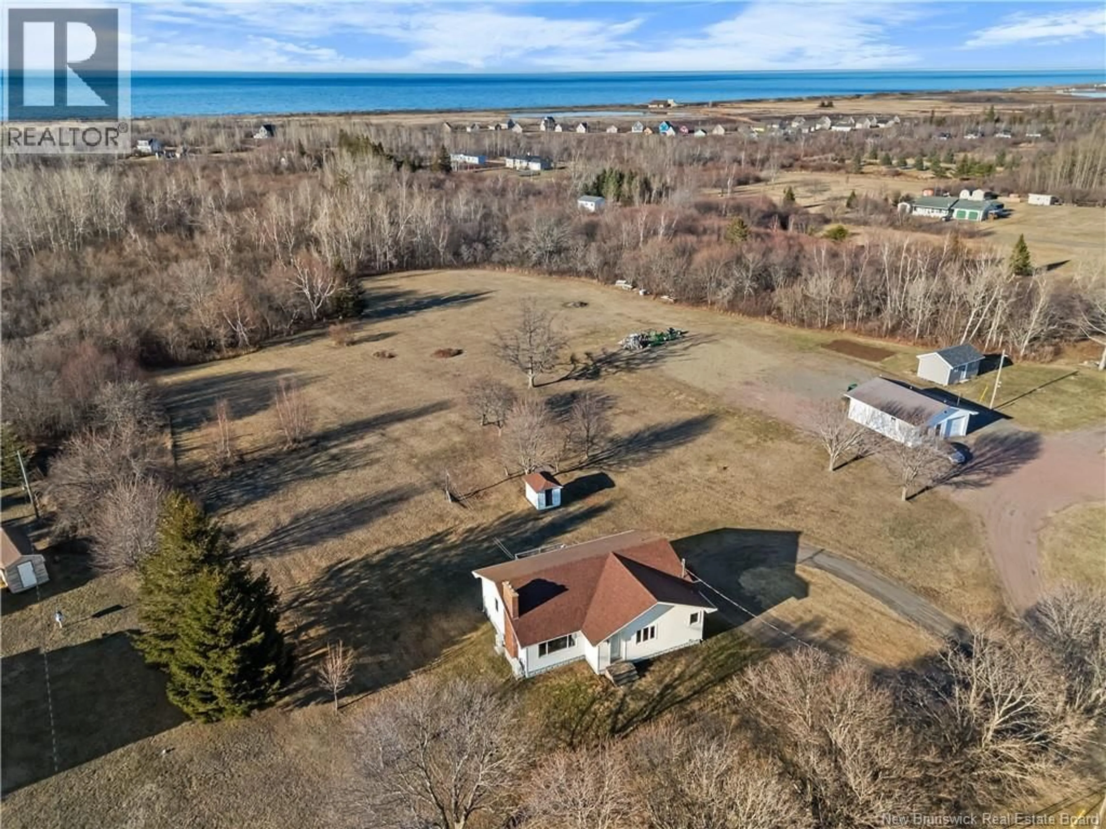 A pic from outside/outdoor area/front of a property/back of a property/a pic from drone, water/lake/river/ocean view for 2260 ACADIE, Cap-Pelé New Brunswick E4N1C2