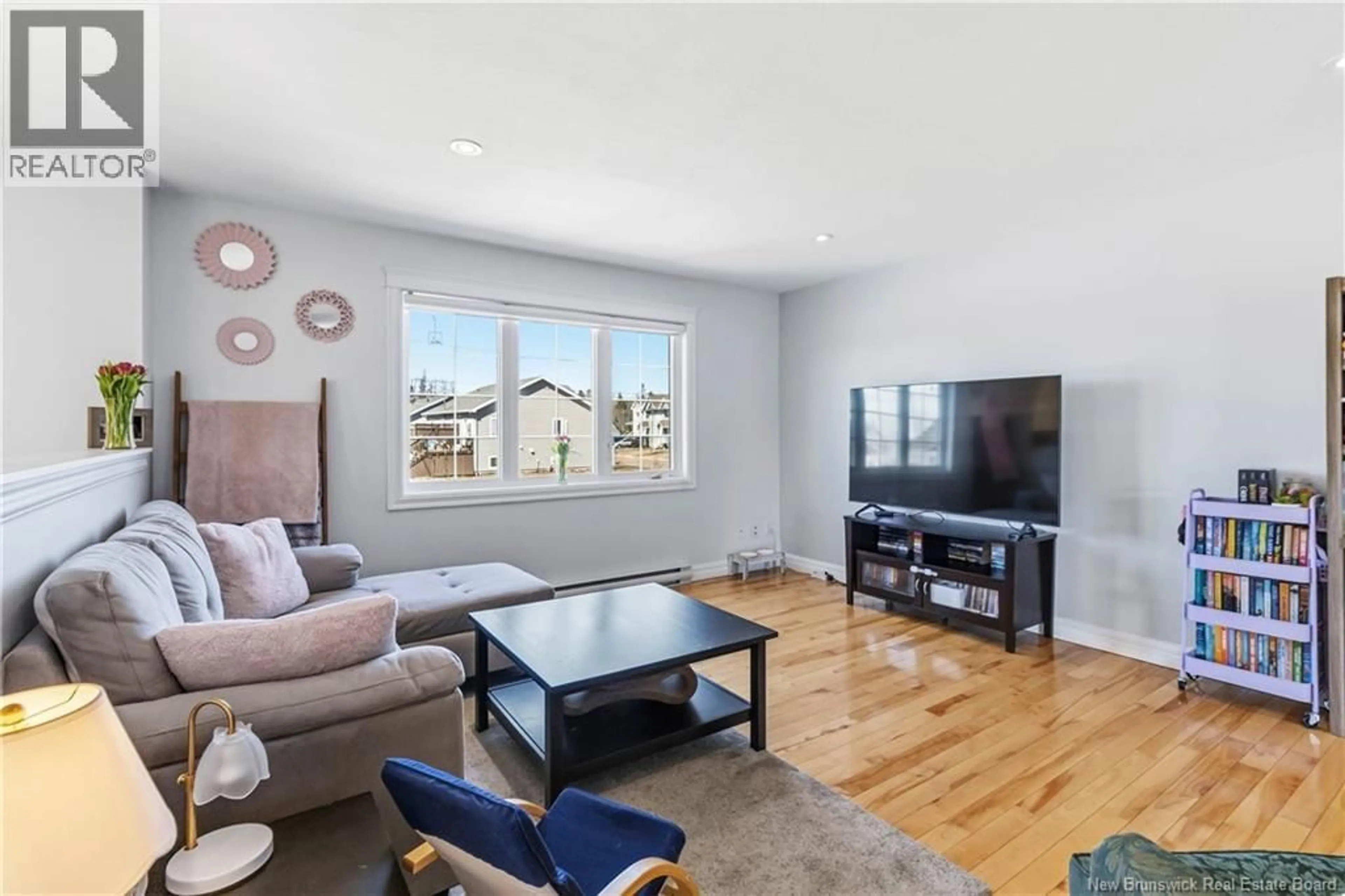 Living room with furniture, unknown for 94 O'NEILL STREET, Moncton New Brunswick E1A9M1