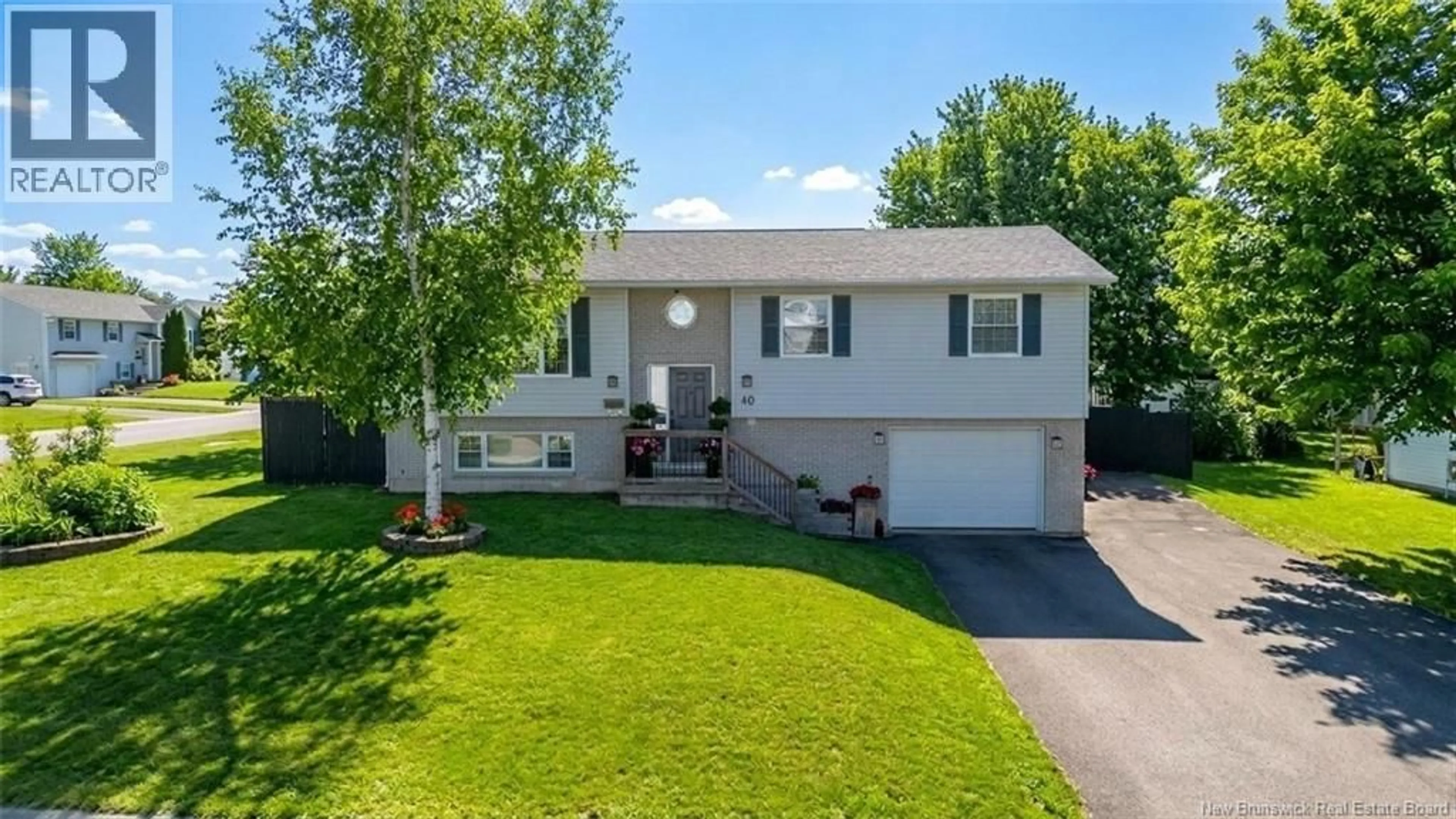 Home with vinyl exterior material, street for 40 MERRETT DRIVE, Oromocto New Brunswick E2V2L7