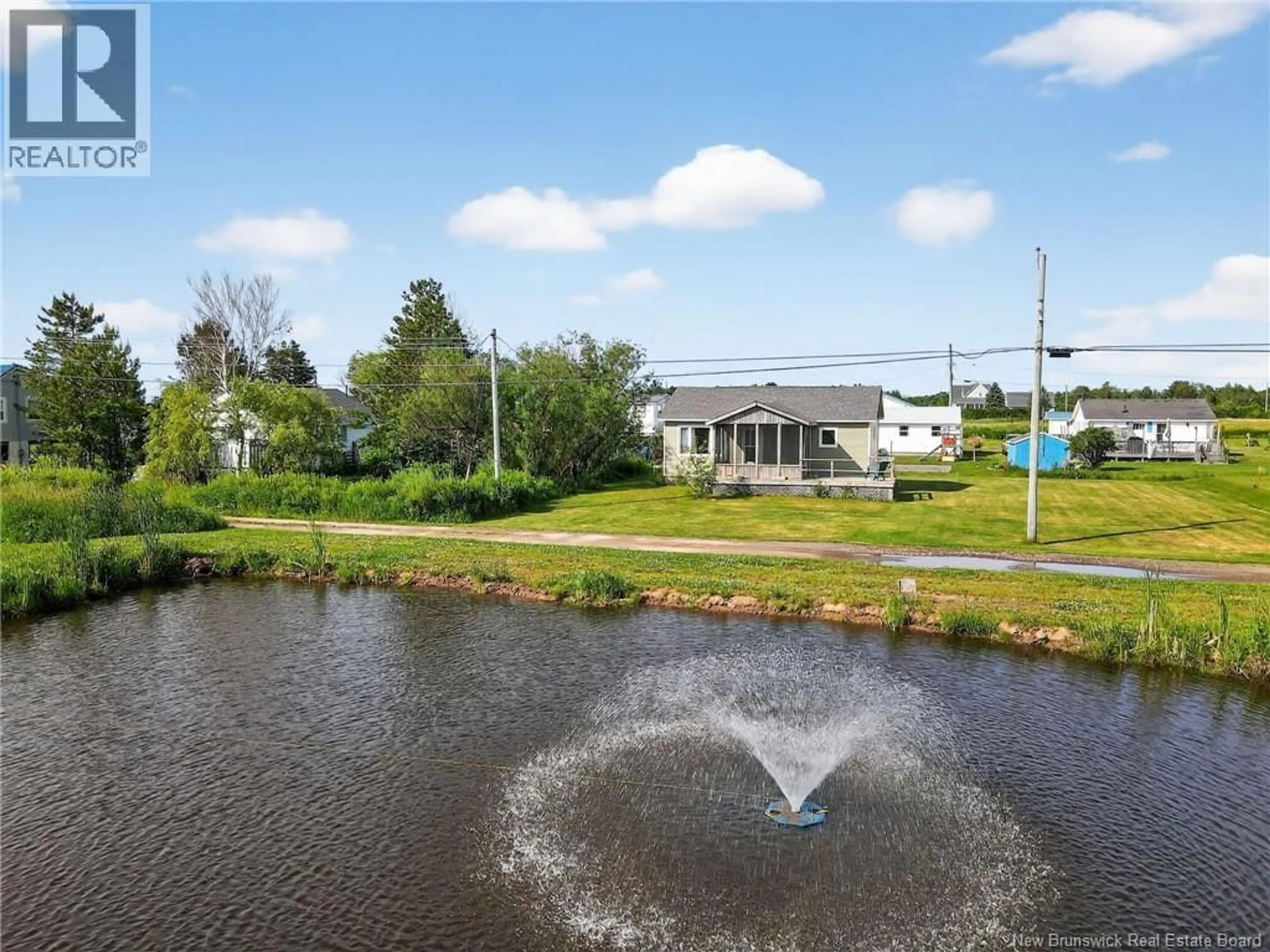 A pic from outside/outdoor area/front of a property/back of a property/a pic from drone, water/lake/river/ocean view for 80 EMMANUEL ROAD, Grande-Digue New Brunswick E4R4J6