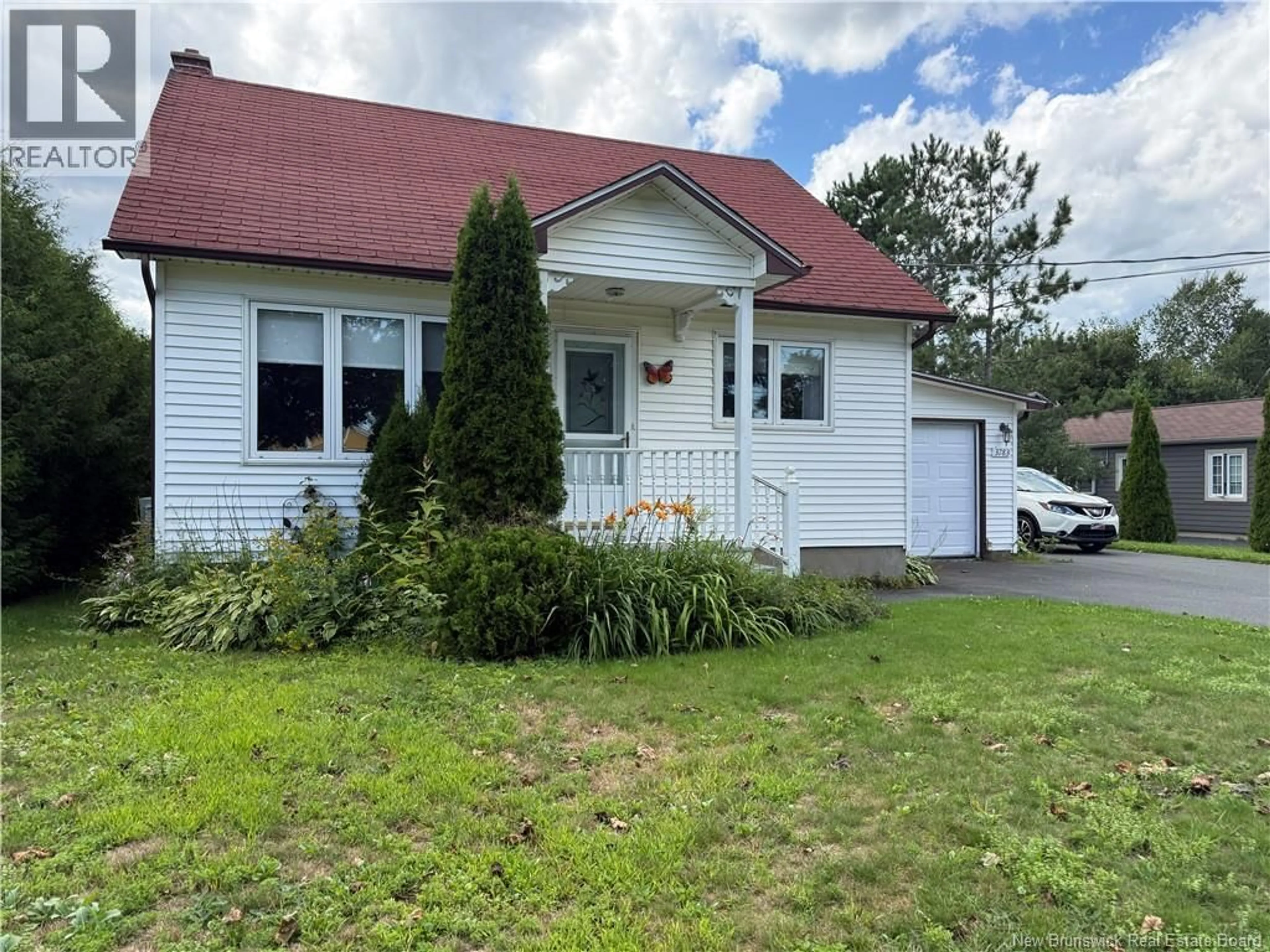Home with vinyl exterior material, street for 3783 RUE PRINCIPALE, Tracadie New Brunswick E1X1E3