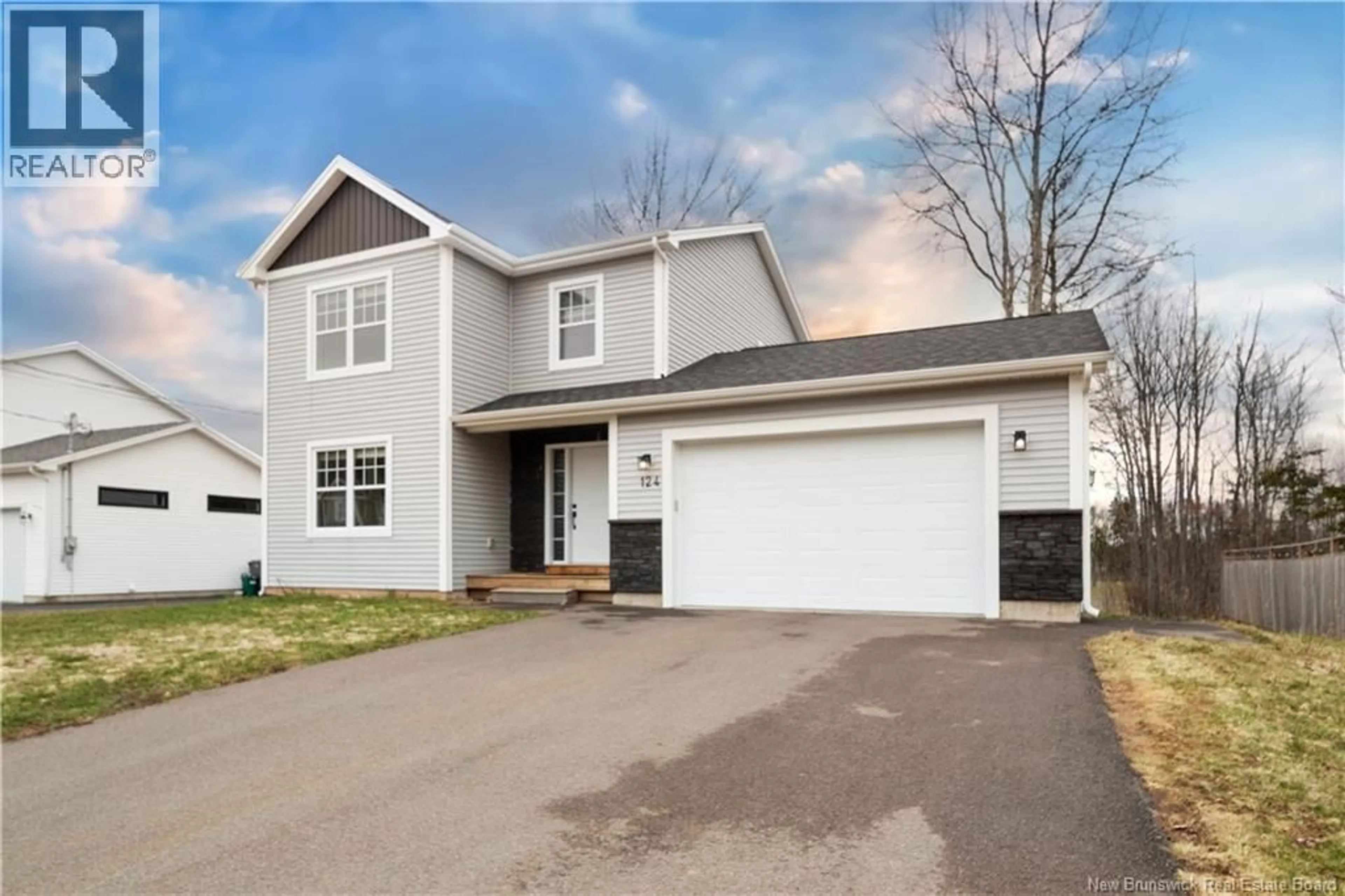 Home with vinyl exterior material, street for 124 DES ELEVES, Dieppe New Brunswick E1A4V6