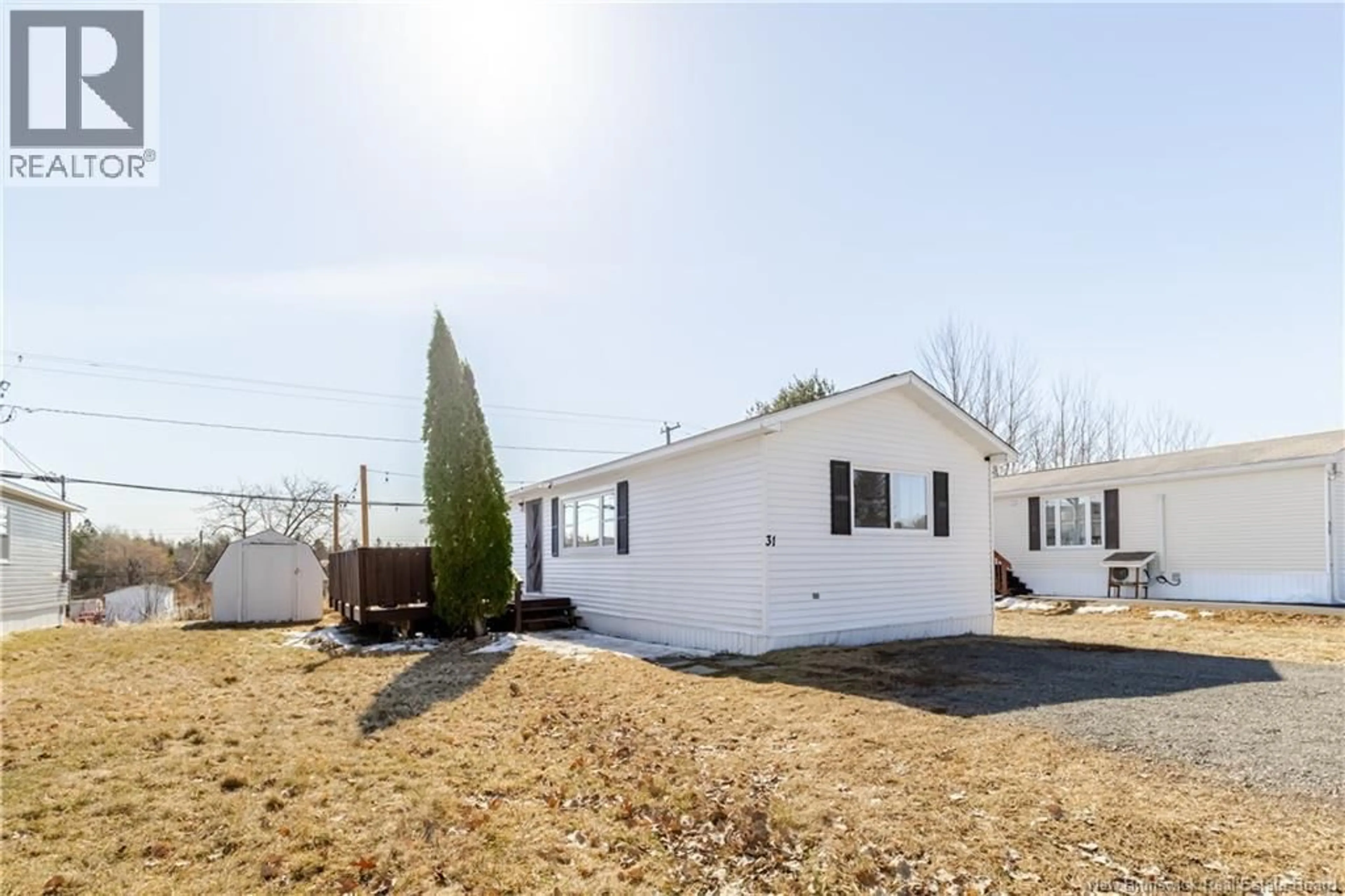A pic from outside/outdoor area/front of a property/back of a property/a pic from drone, street for 31 LEAFWOOD CRESCENT, Fredericton New Brunswick E3B6N6