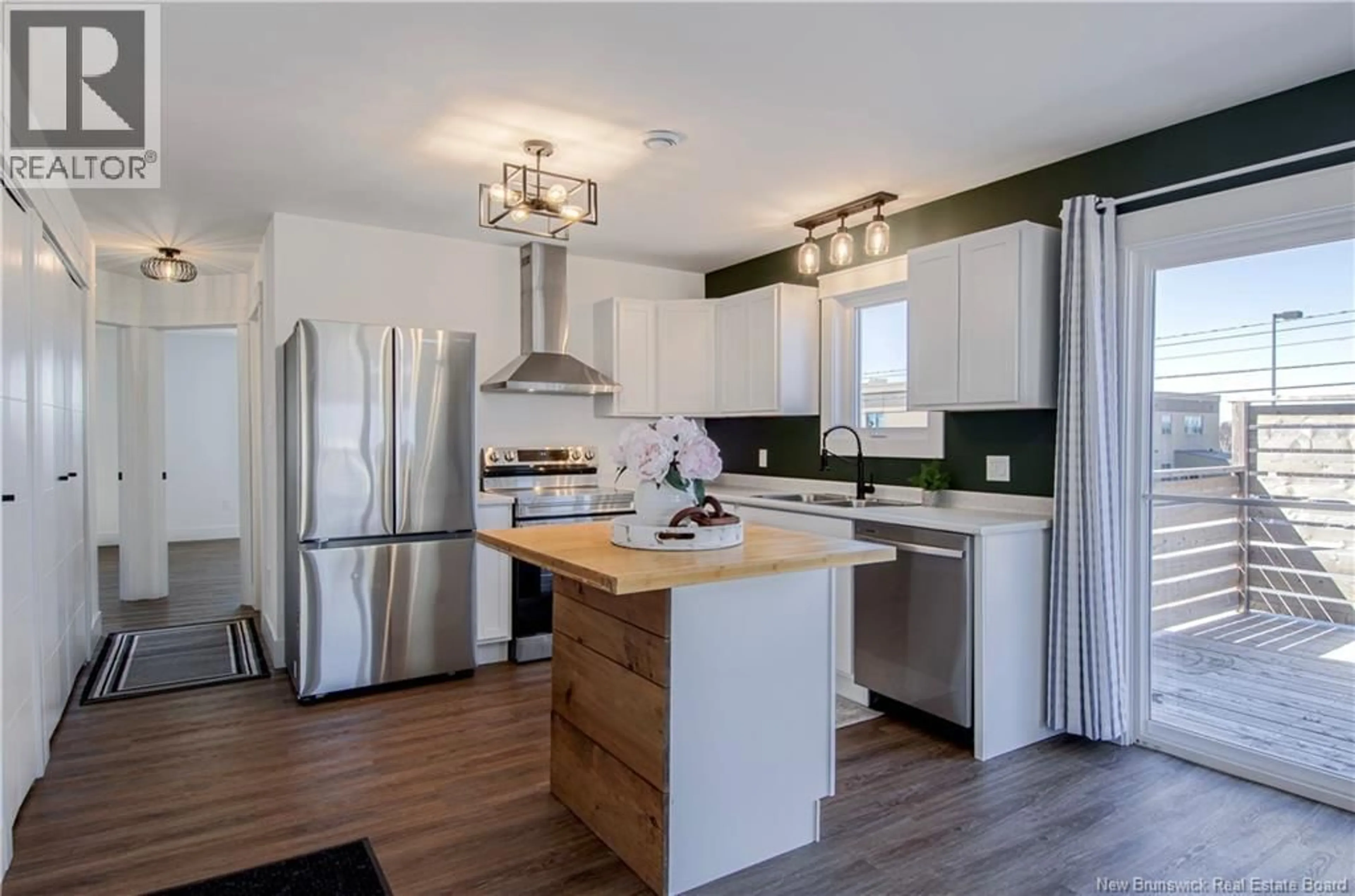 Open concept kitchen, wood/laminate floor for 2 COLTER STREET, Saint John New Brunswick E2J0L8