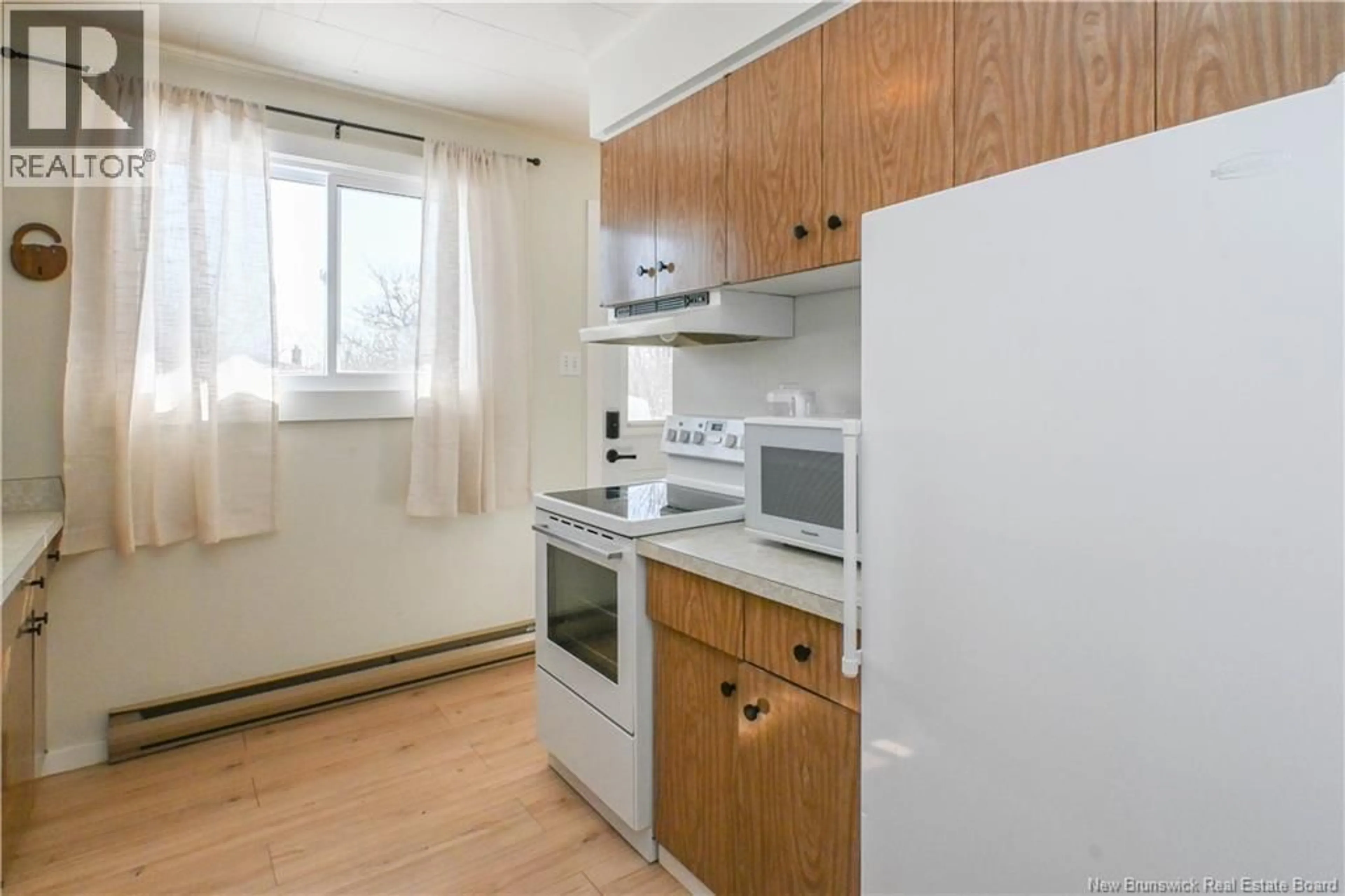 Standard kitchen, wood/laminate floor for 148 DES PINS STREET, Shippagan New Brunswick E8S1K2