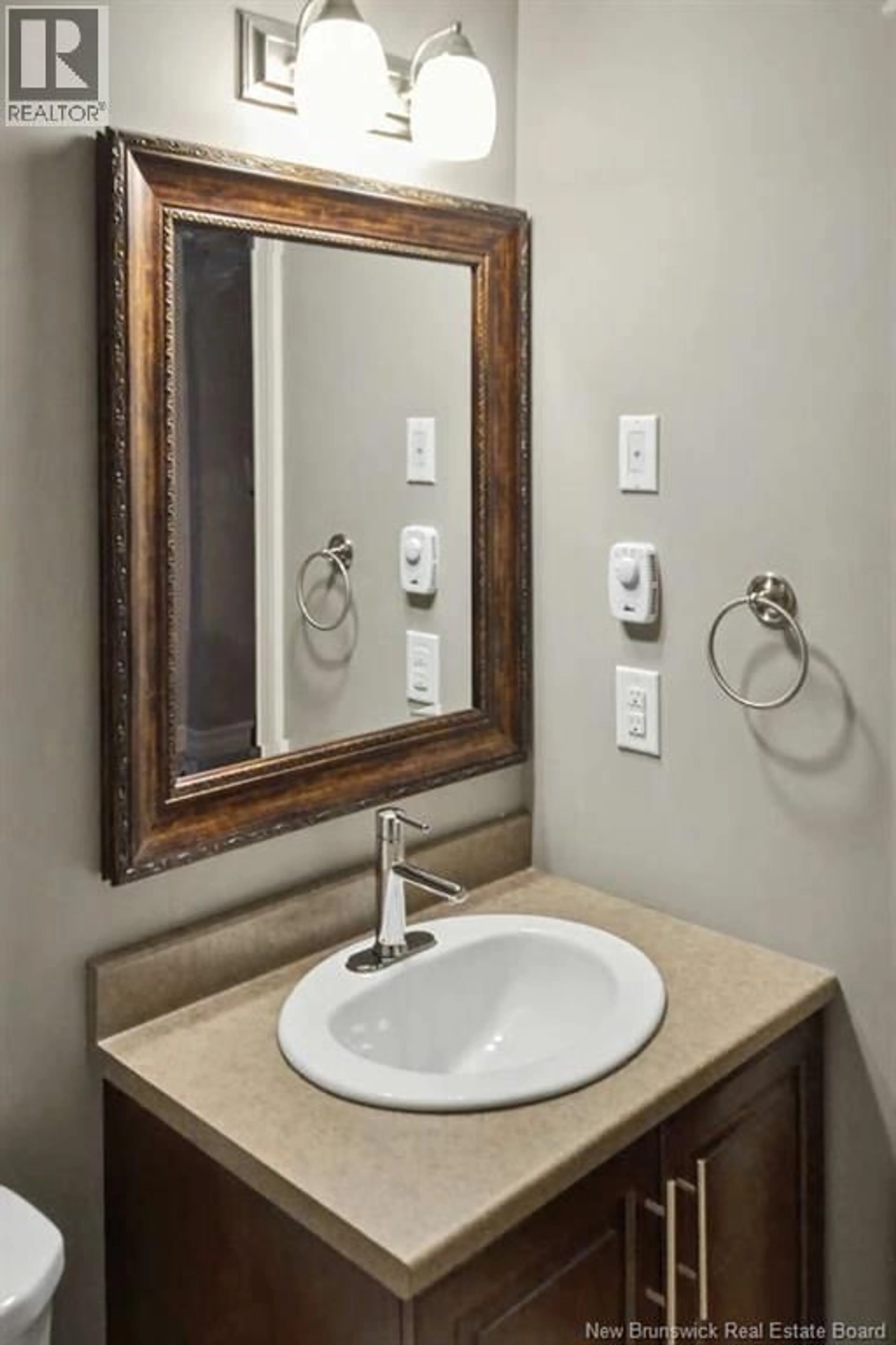 Standard bathroom, ceramic/tile floor for 64 RUE LIONEL, Dieppe New Brunswick E1E4V3