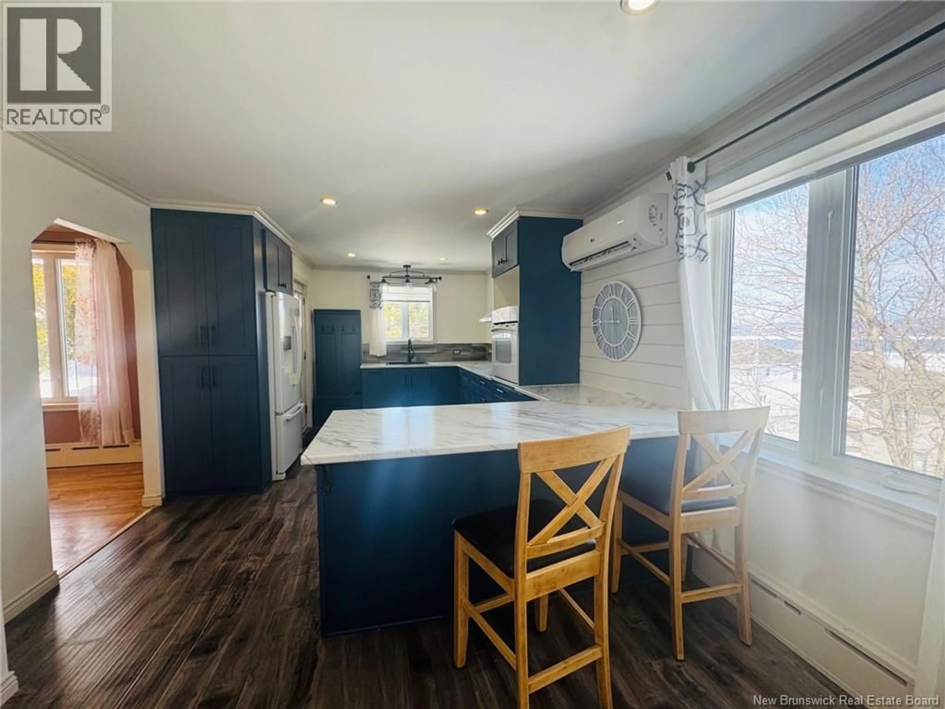 Open concept kitchen, wood/laminate floor for 345 VICTORIA STREET, Dalhousie New Brunswick E8C2T7
