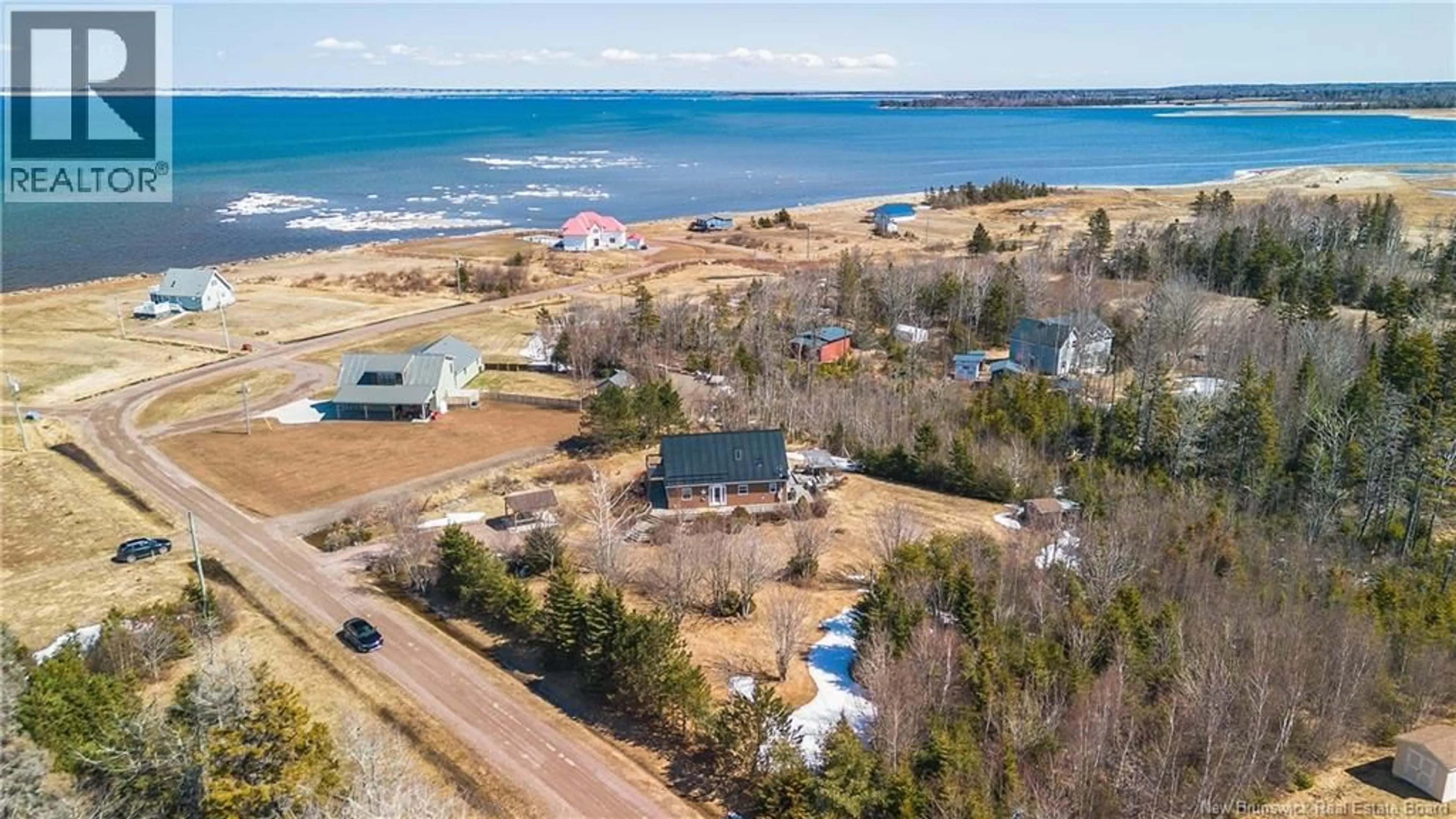 A pic from outside/outdoor area/front of a property/back of a property/a pic from drone, water/lake/river/ocean view for 9 SPENCES BEACH ROAD, Murray Corner New Brunswick E4M3R4