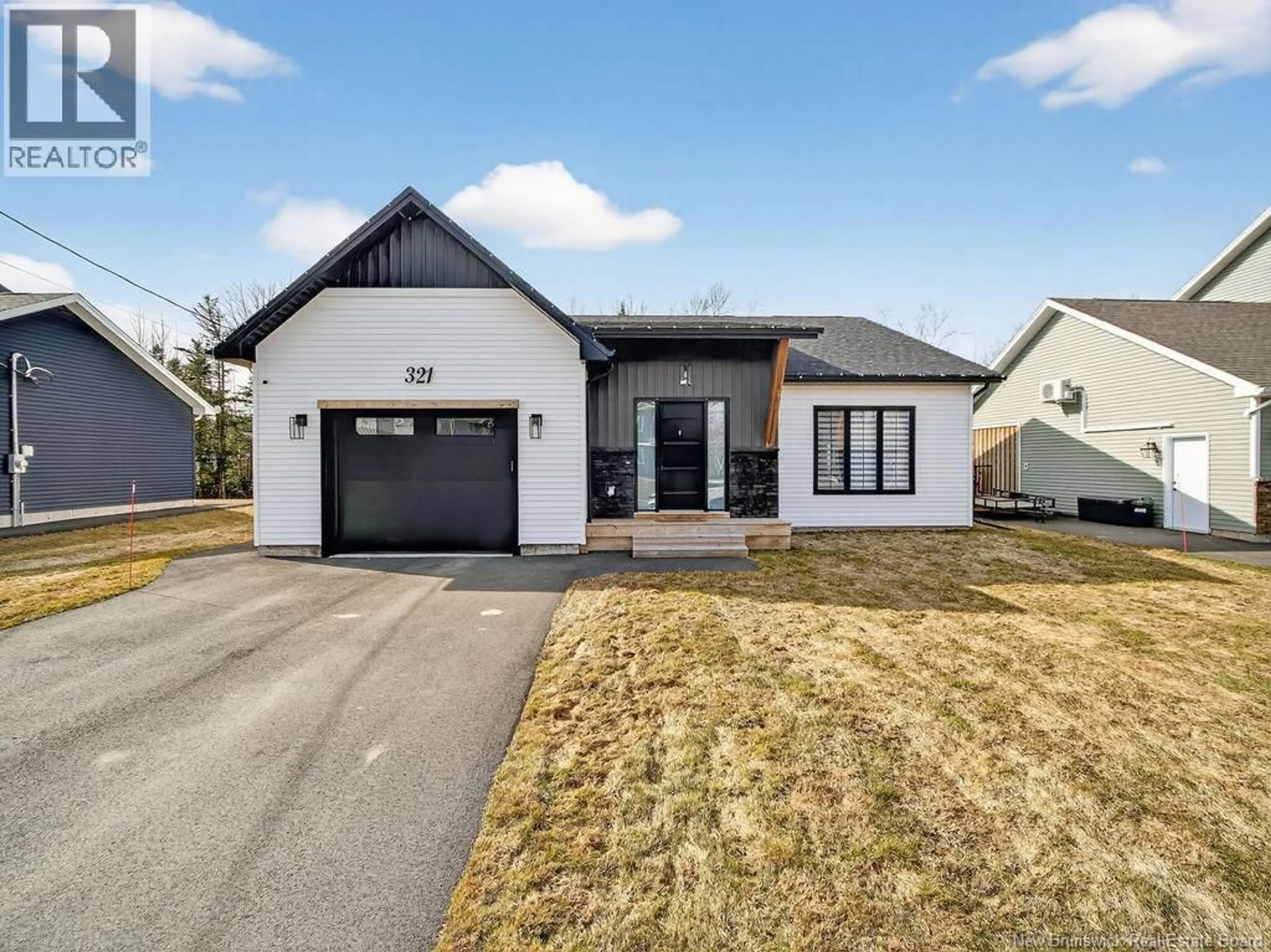 Home with brick exterior material, street for 321 FALCON DRIVE, Moncton New Brunswick E1G6J6