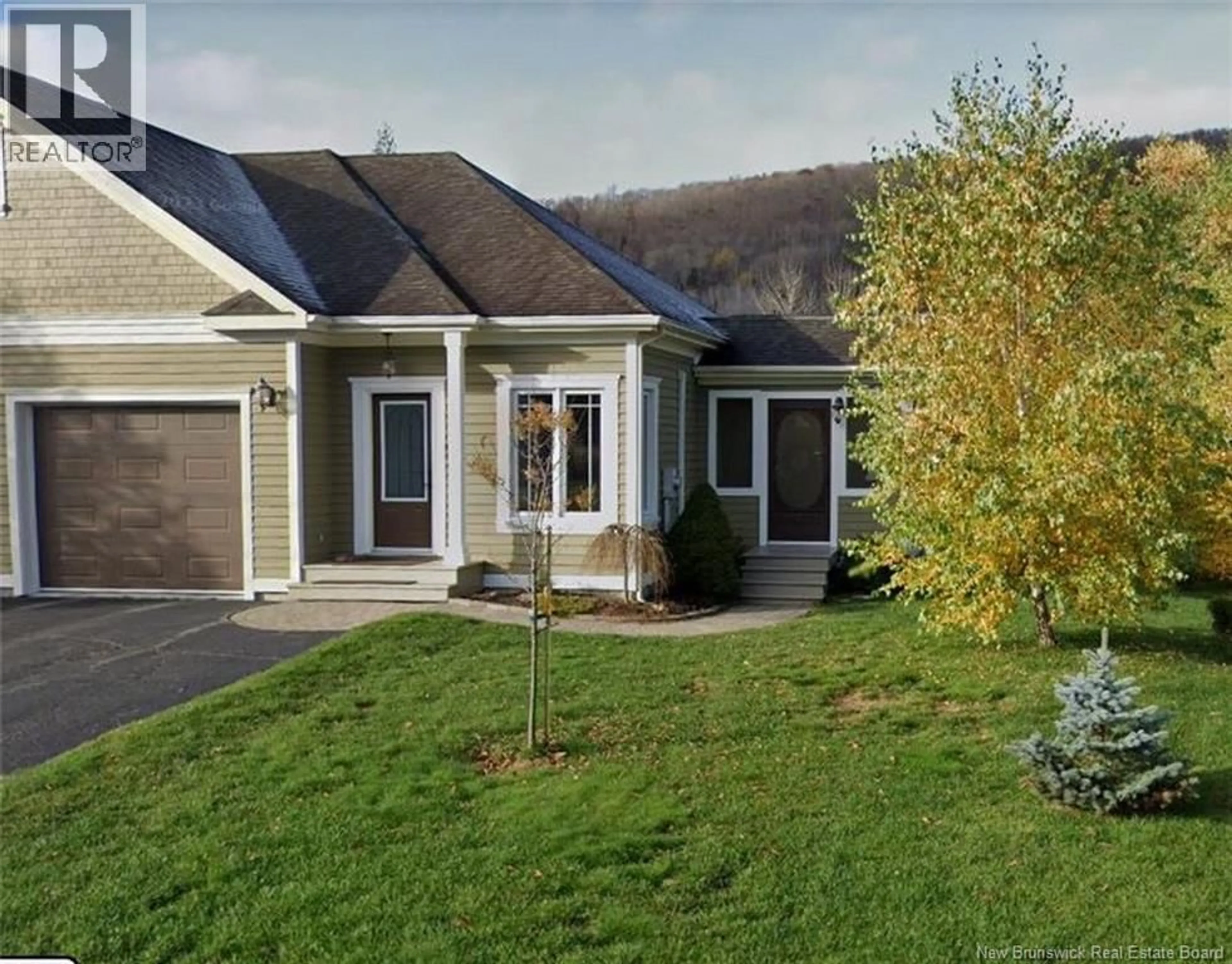 Home with vinyl exterior material, mountain view for 8 LOUISE STREET, Edmundston New Brunswick E3V0C3