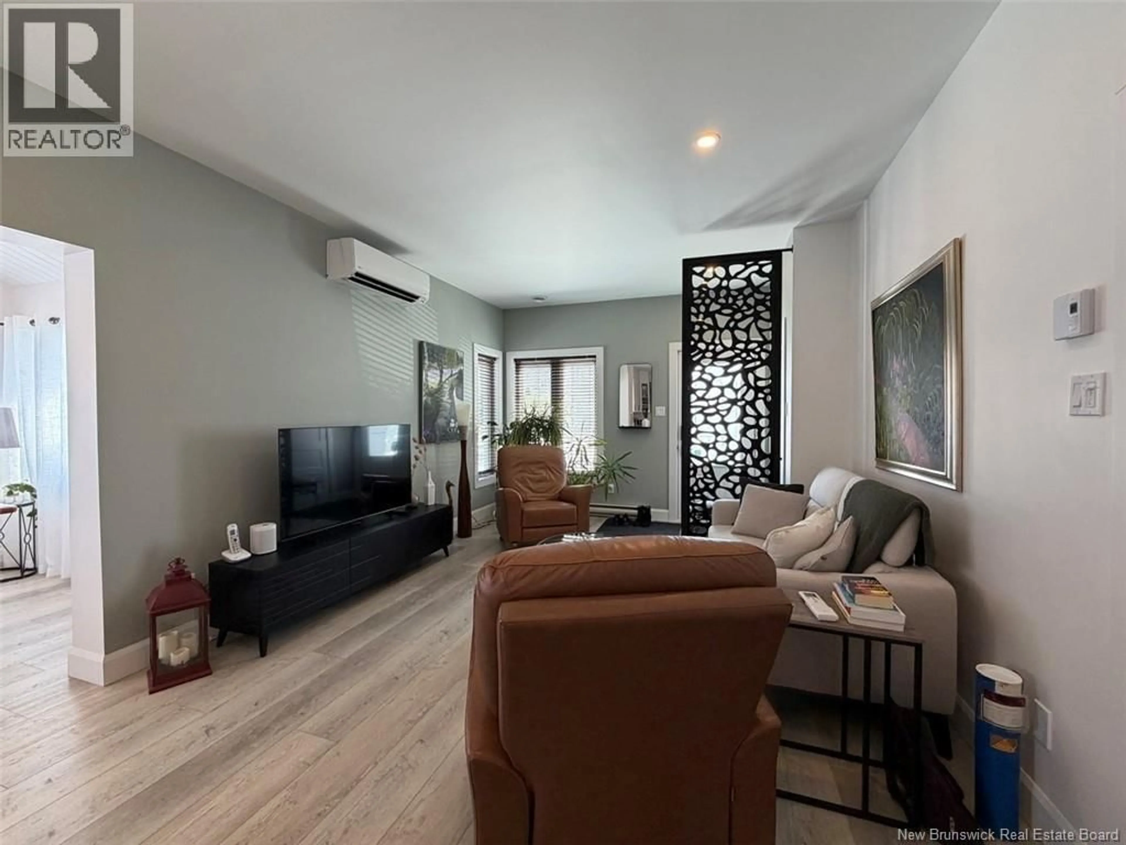 Living room with furniture, unknown for 8 LOUISE STREET, Edmundston New Brunswick E3V0C3