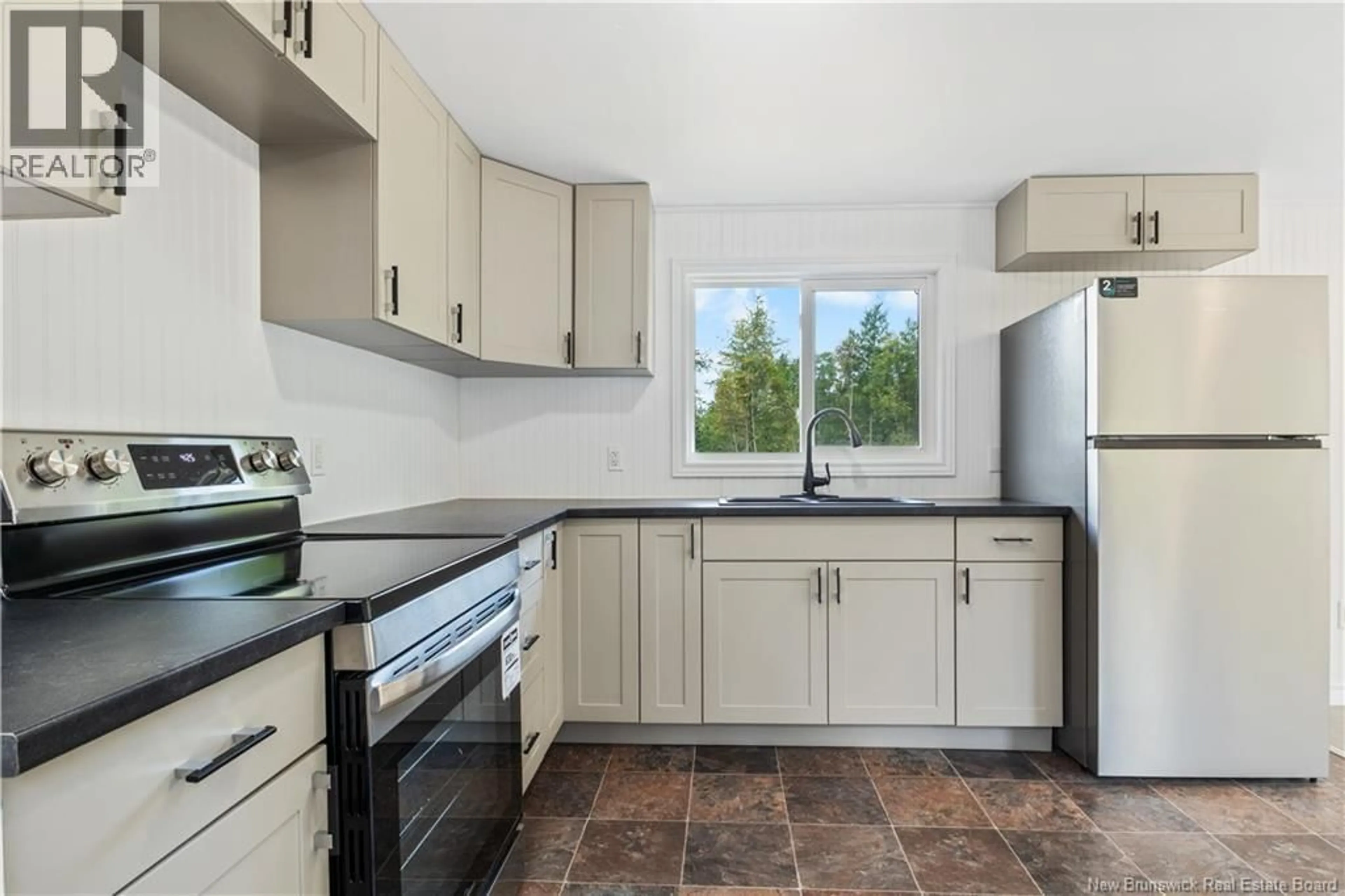 Standard kitchen, ceramic/tile floor for 107 BREAU CREEK, Memramcook New Brunswick E4K2K1