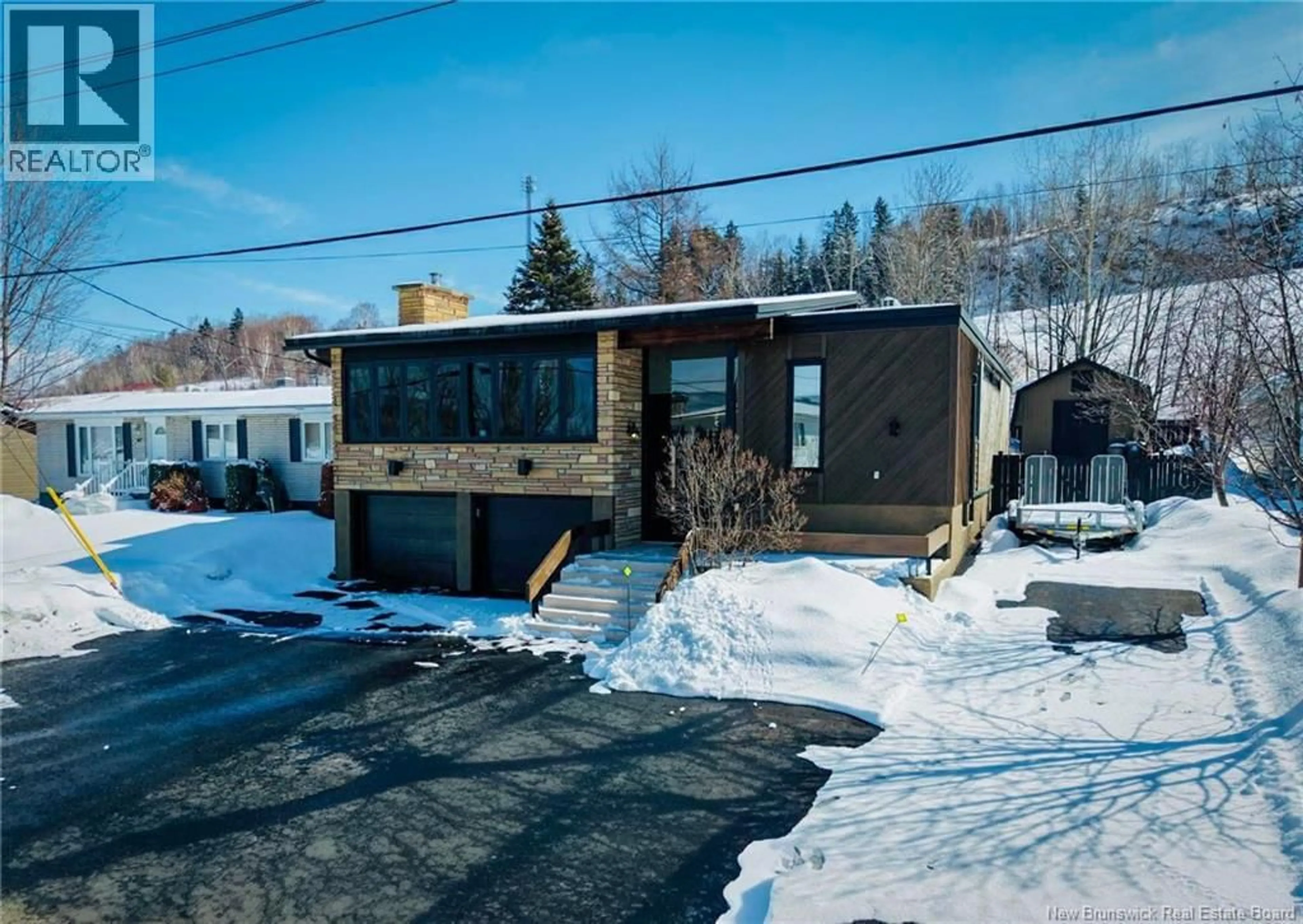 A pic from outside/outdoor area/front of a property/back of a property/a pic from drone, street for 65 FAIRVIEW STREET, Atholville New Brunswick E3N4N3