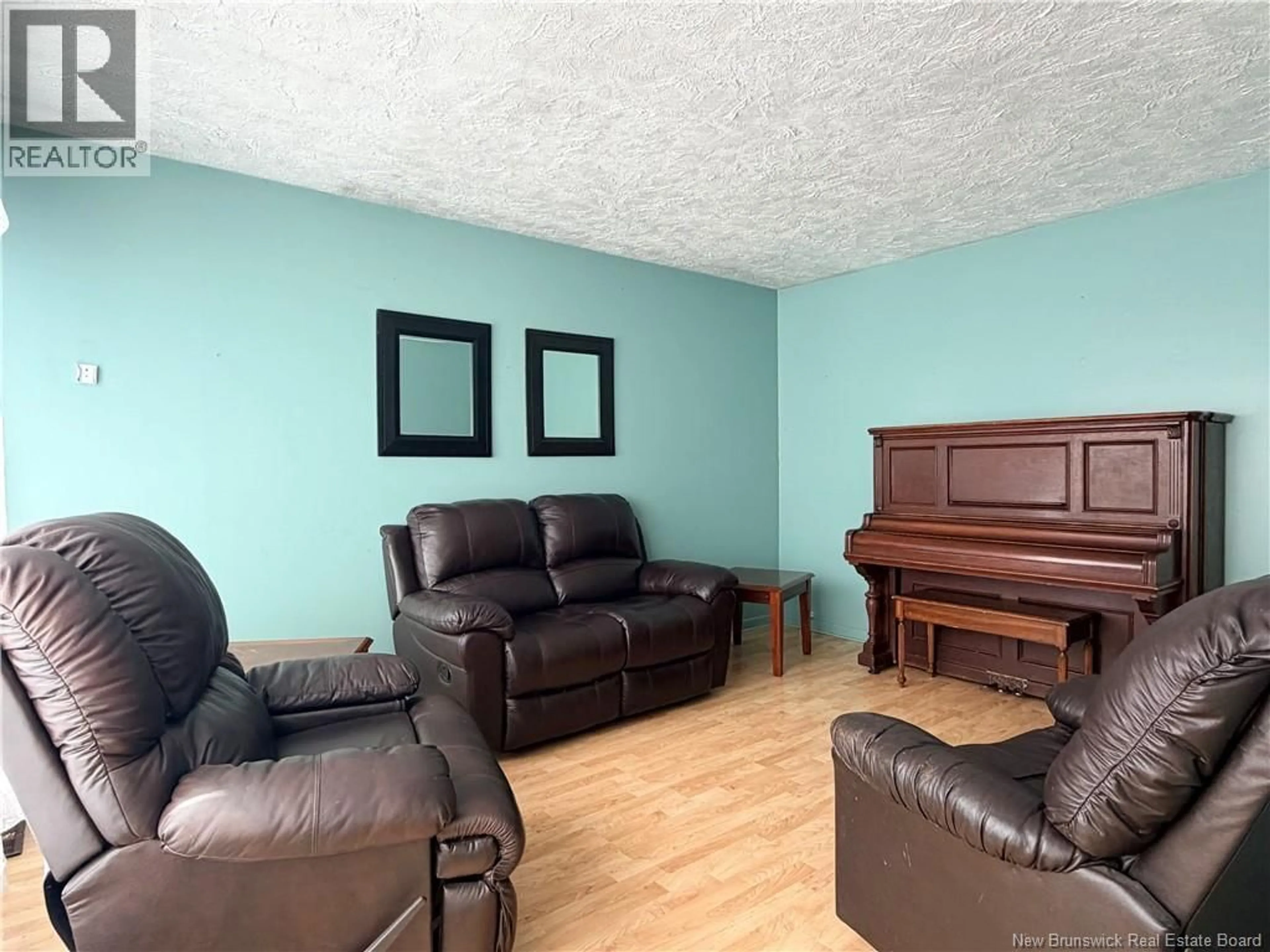Living room with furniture, unknown for 6585 ROUTE 11, Clifton New Brunswick E2A5L7