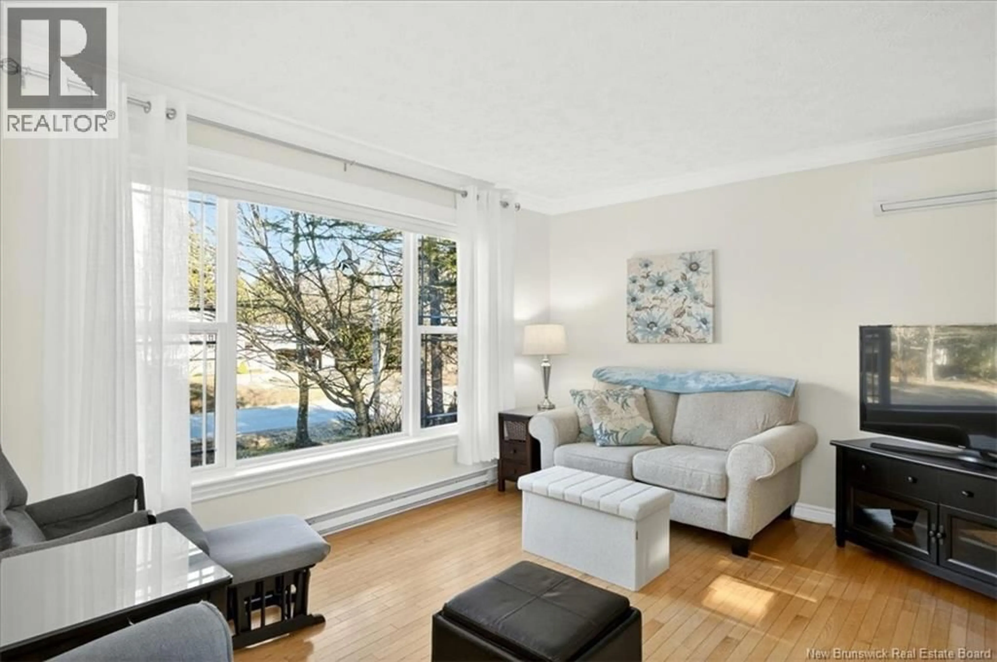 Living room with furniture, unknown for 15 LYMAN DRIVE, Quispamsis New Brunswick E2E4L2