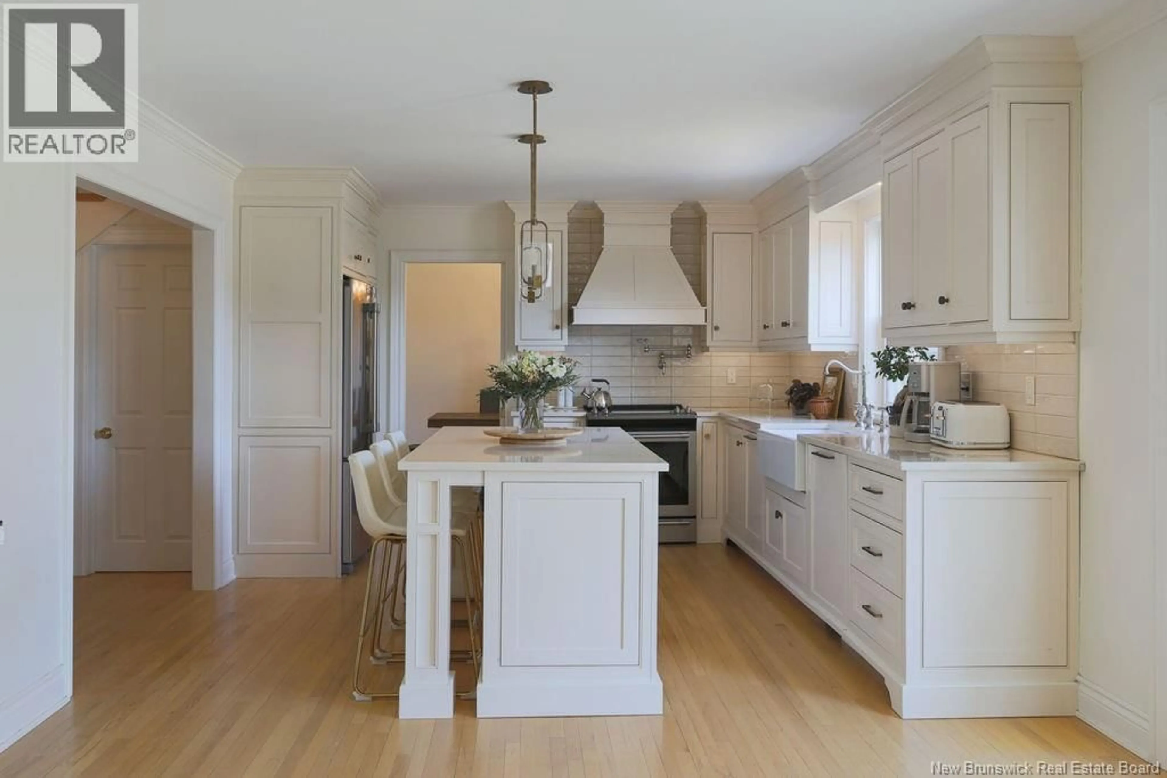 Open concept kitchen, wood/laminate floor for 76 PARK DRIVE, Rothesay New Brunswick E2H2S8