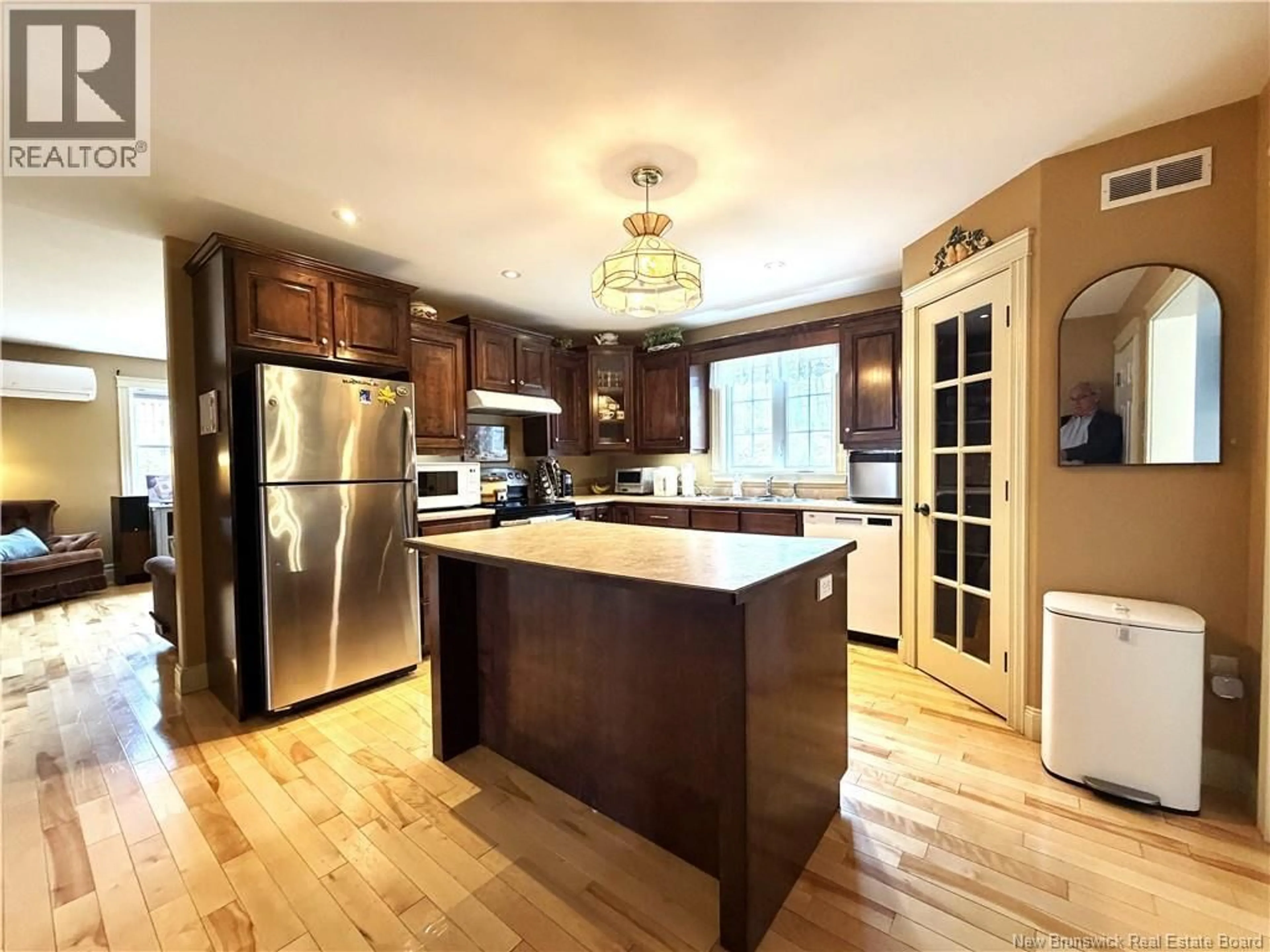 Open concept kitchen, wood/laminate floor for 80 BLANCHARD COURT, Fredericton New Brunswick E3G3X2