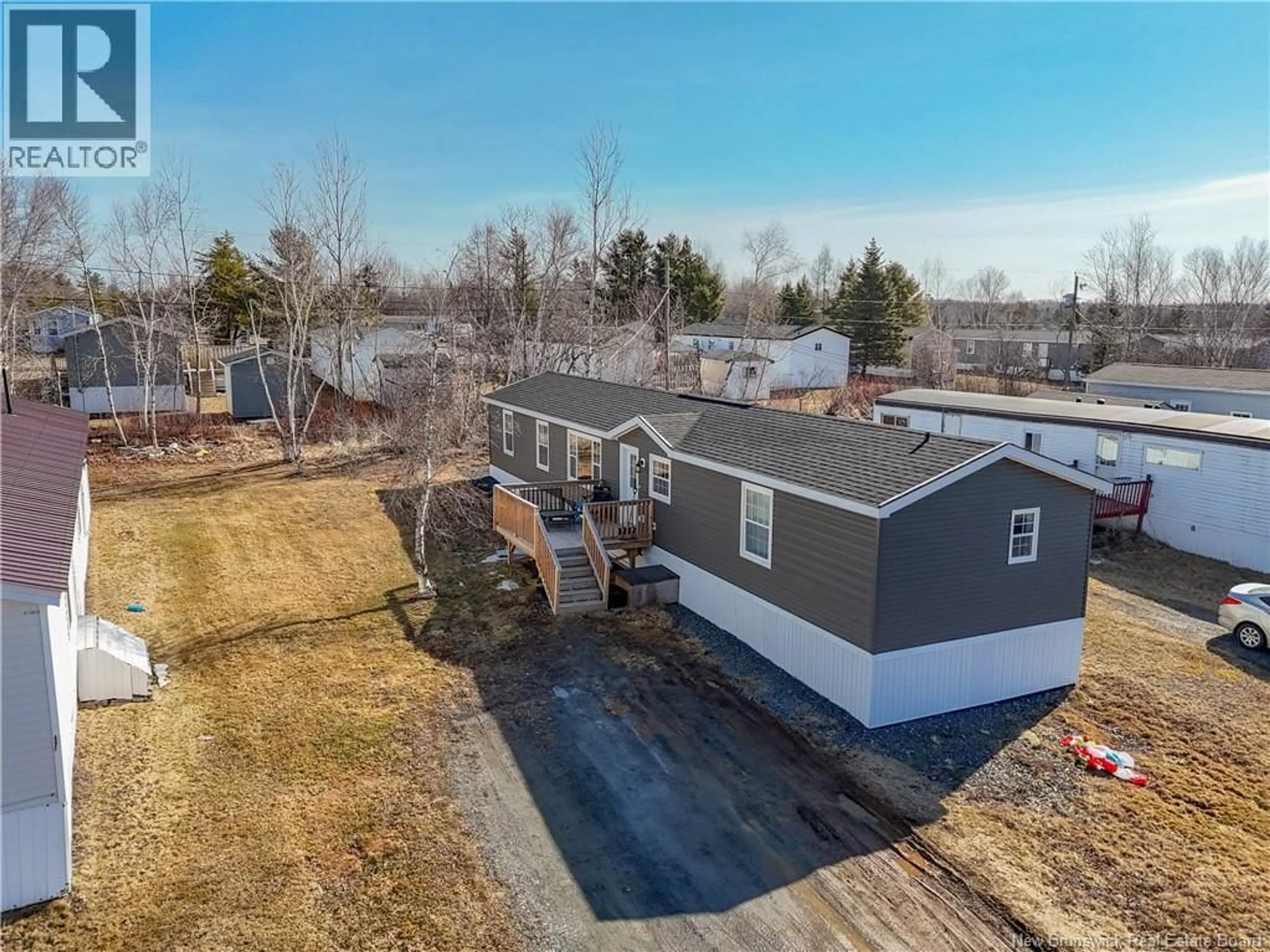 A pic from outside/outdoor area/front of a property/back of a property/a pic from drone, unknown for 42 ELMDALE CRESCENT, Fredericton New Brunswick E3B6R1