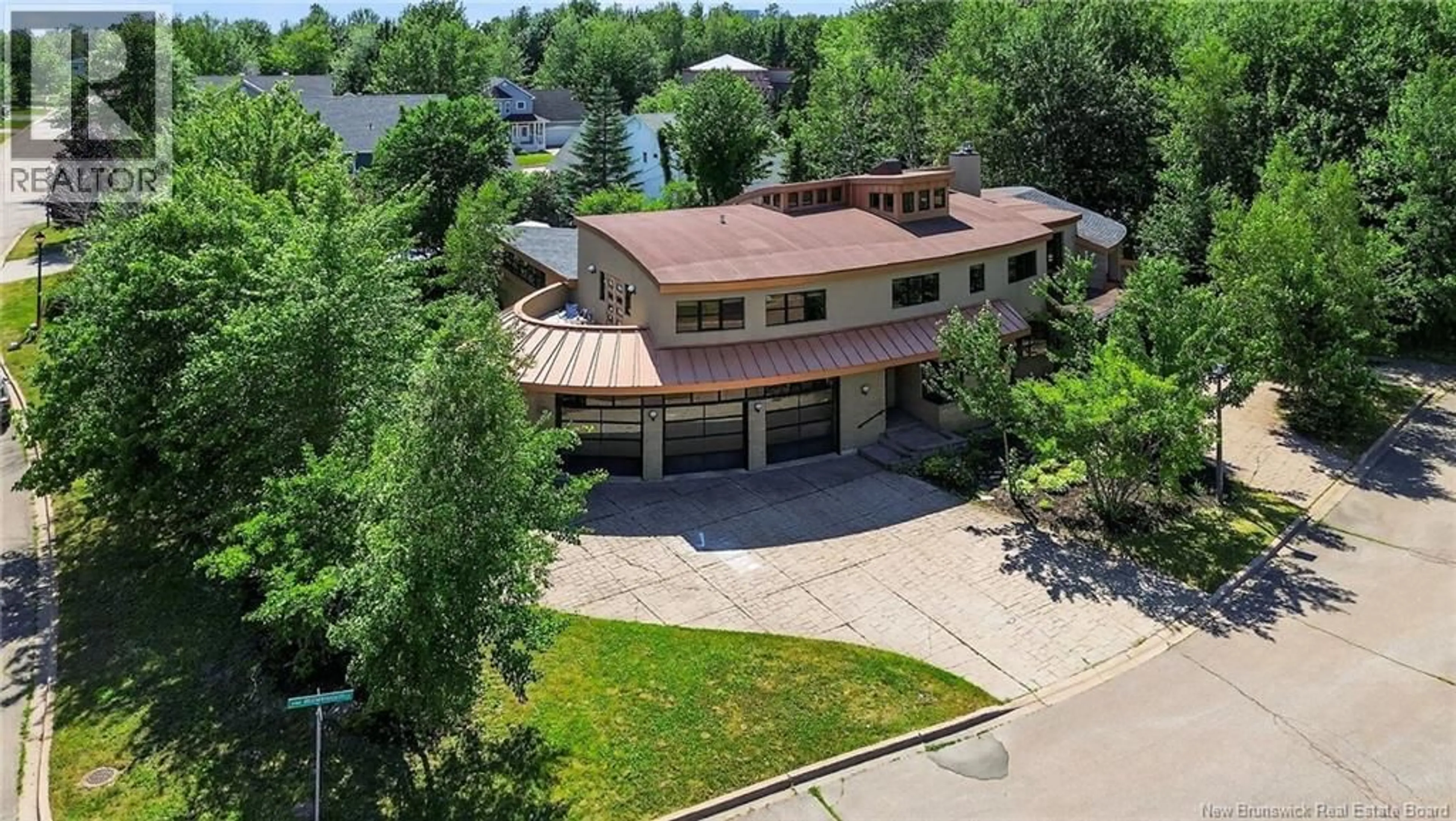 A pic from outside/outdoor area/front of a property/back of a property/a pic from drone, water/lake/river/ocean view for 6 BRANDYWOOD, Moncton New Brunswick E1G3V9