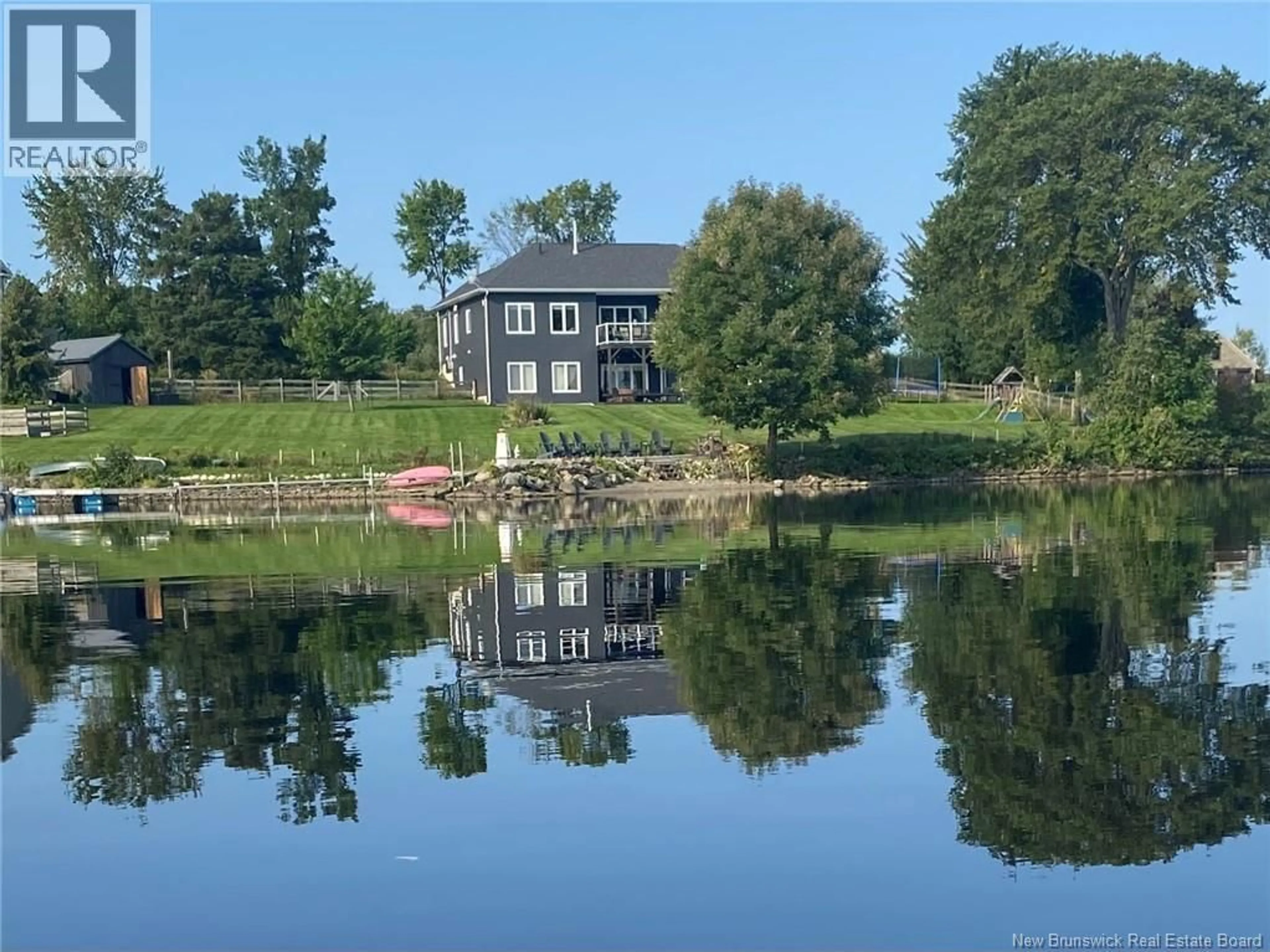 A pic from outside/outdoor area/front of a property/back of a property/a pic from drone, water/lake/river/ocean view for 50 SANDCASTLE LANE, Upper Kingsclear New Brunswick E3E0A4