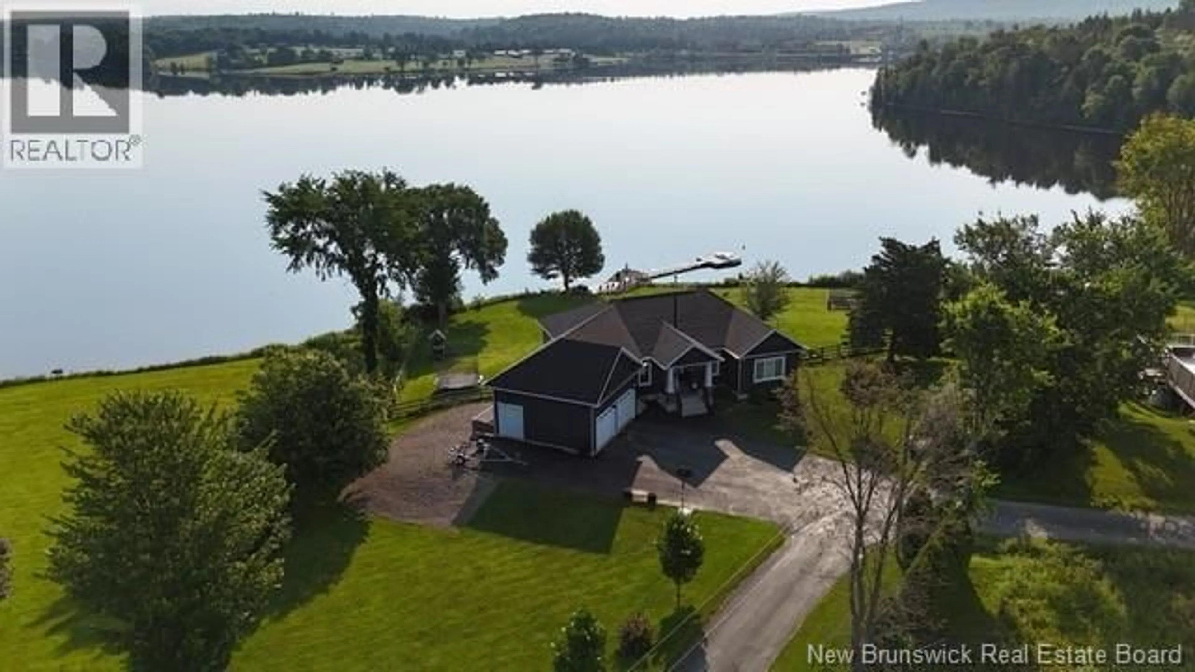 A pic from outside/outdoor area/front of a property/back of a property/a pic from drone, water/lake/river/ocean view for 50 SANDCASTLE LANE, Upper Kingsclear New Brunswick E3E0A4