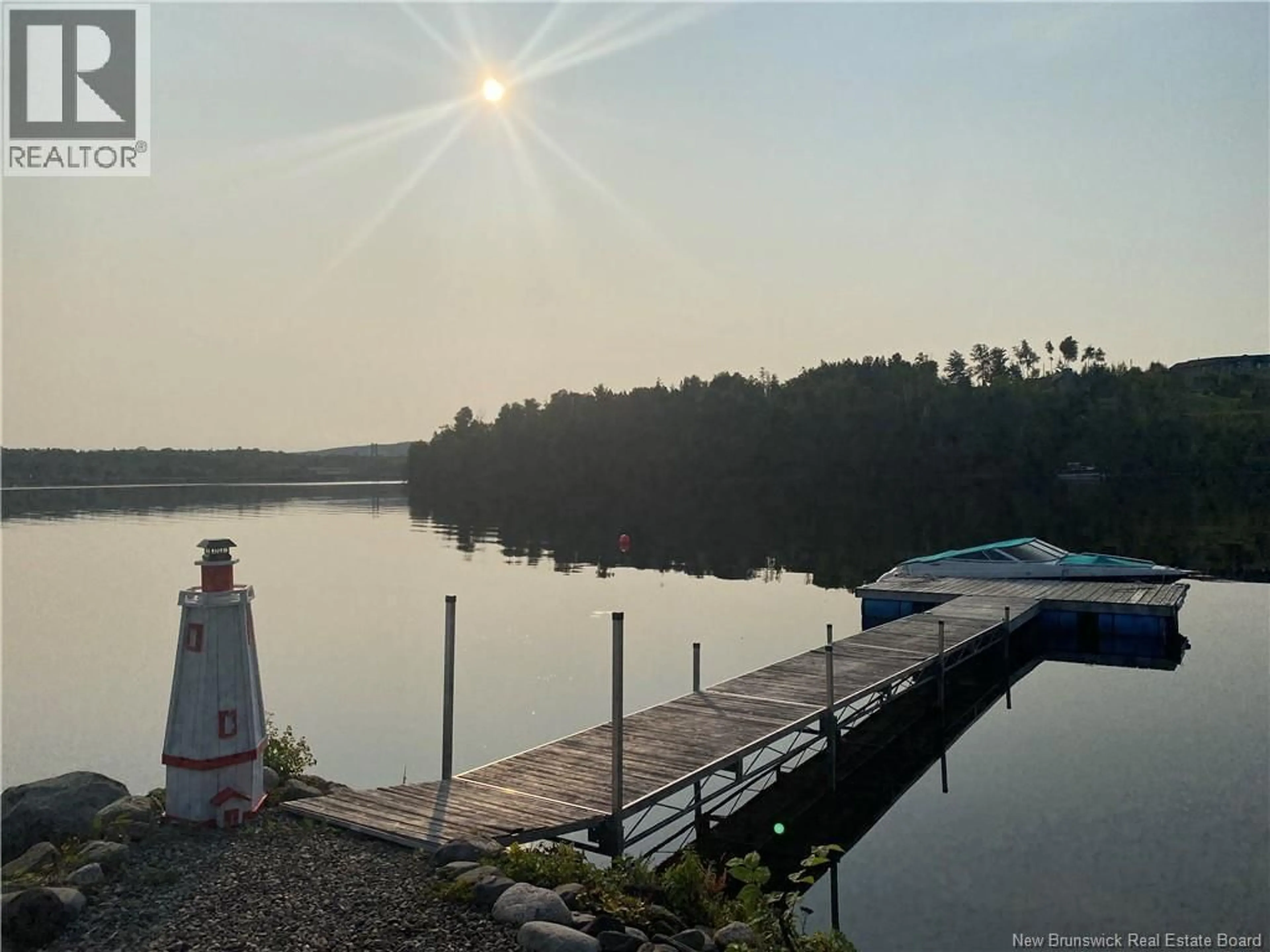 A pic from outside/outdoor area/front of a property/back of a property/a pic from drone, water/lake/river/ocean view for 50 SANDCASTLE LANE, Upper Kingsclear New Brunswick E3E0A4