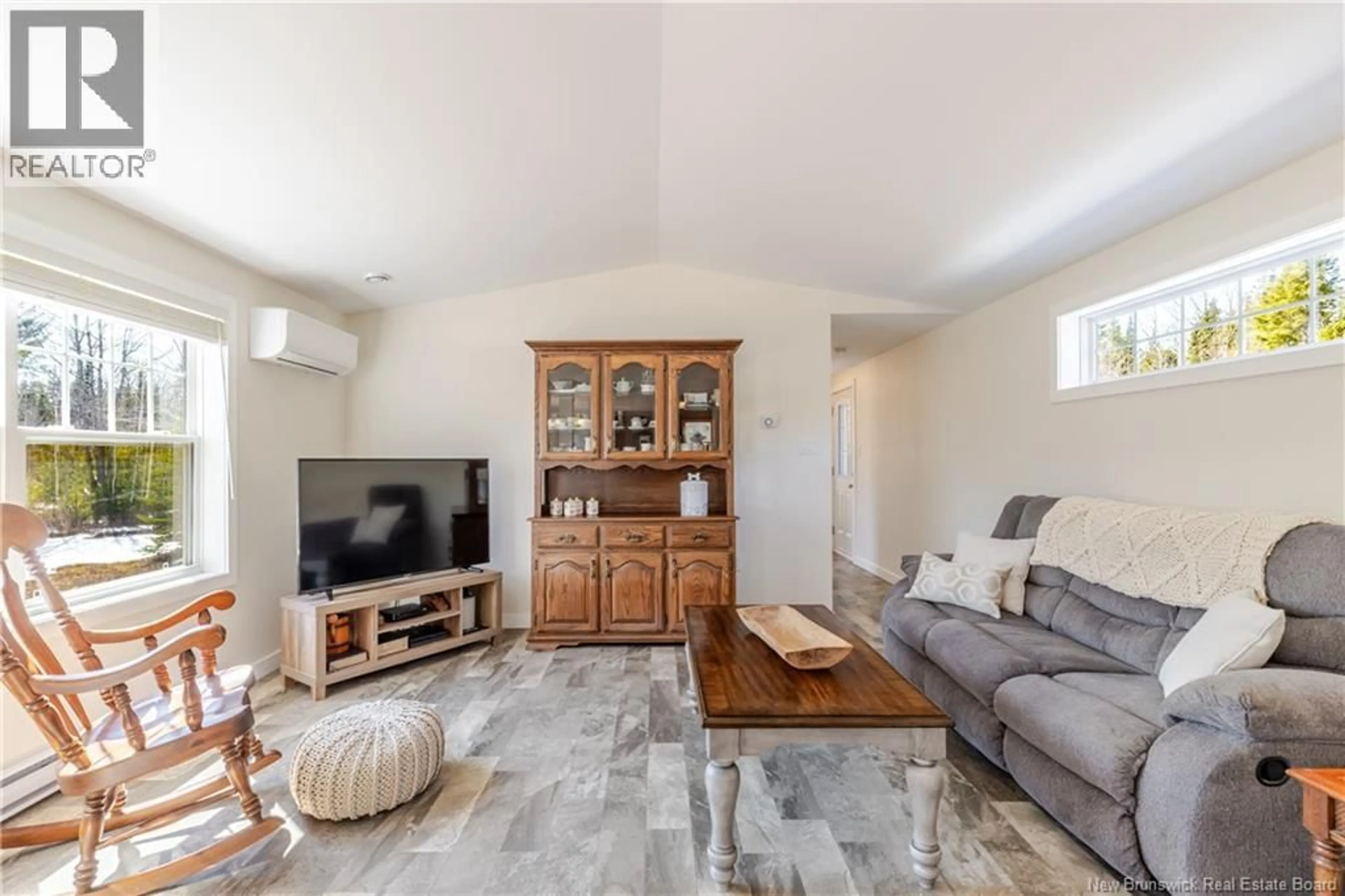 Living room with furniture, unknown for 247 POST ROAD, Minto New Brunswick E4B3A2