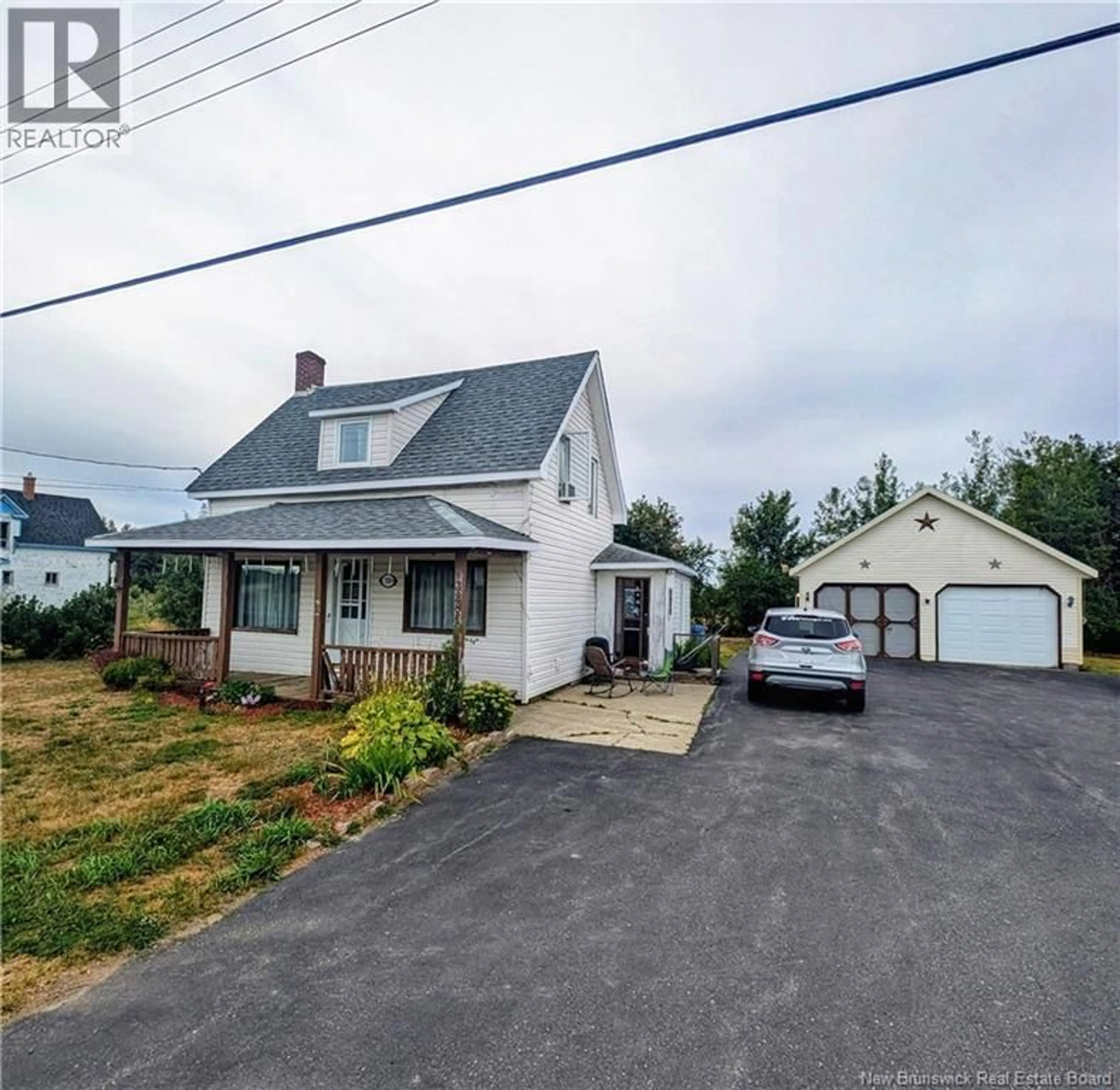 A pic from outside/outdoor area/front of a property/back of a property/a pic from drone, street for 328 BD DES ACADIENS, Bertrand New Brunswick E1W1C6