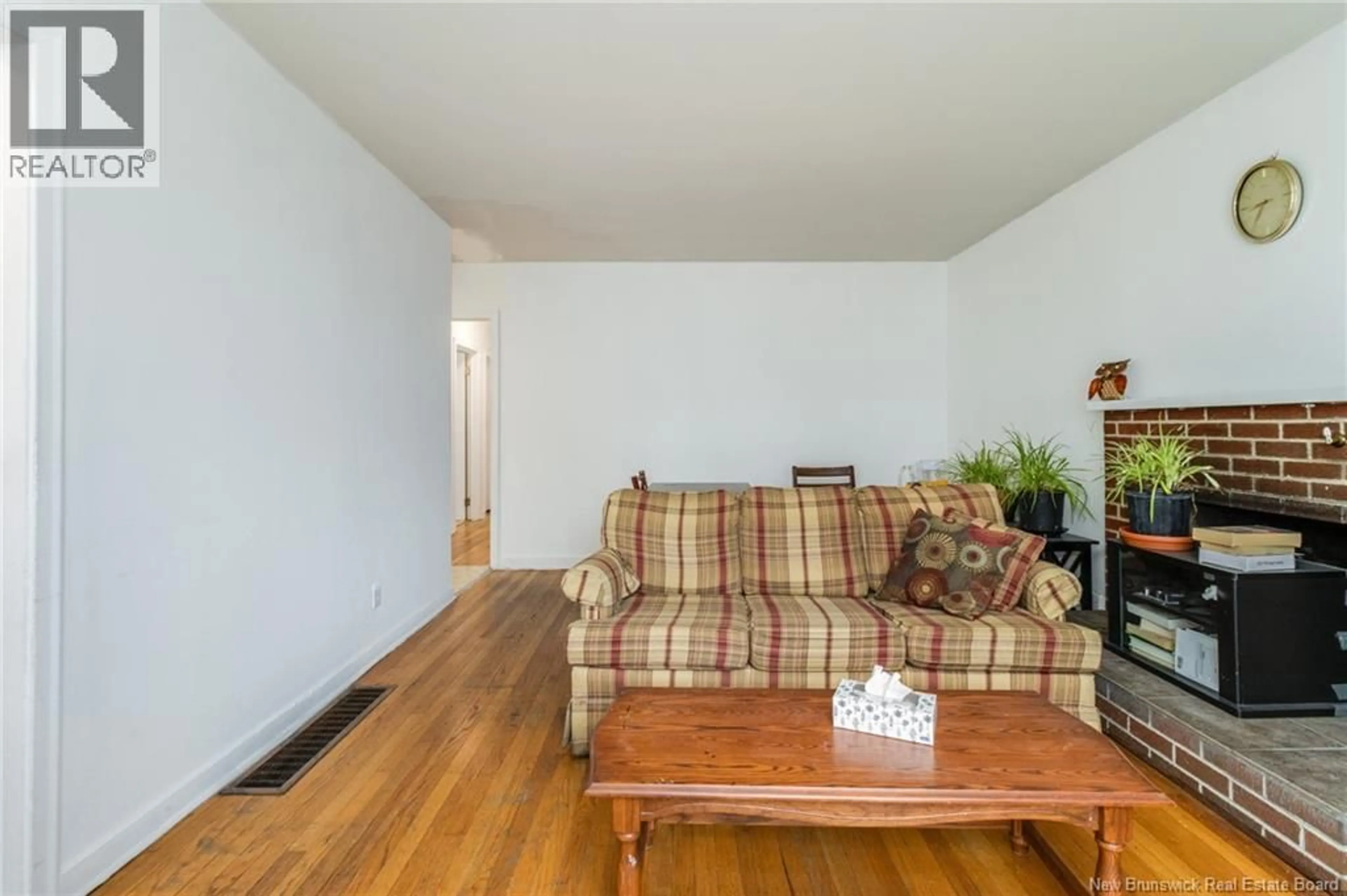 Living room with furniture, wood/laminate floor for 440 PEDERSON CRESCENT, Fredericton New Brunswick E3B2Z2
