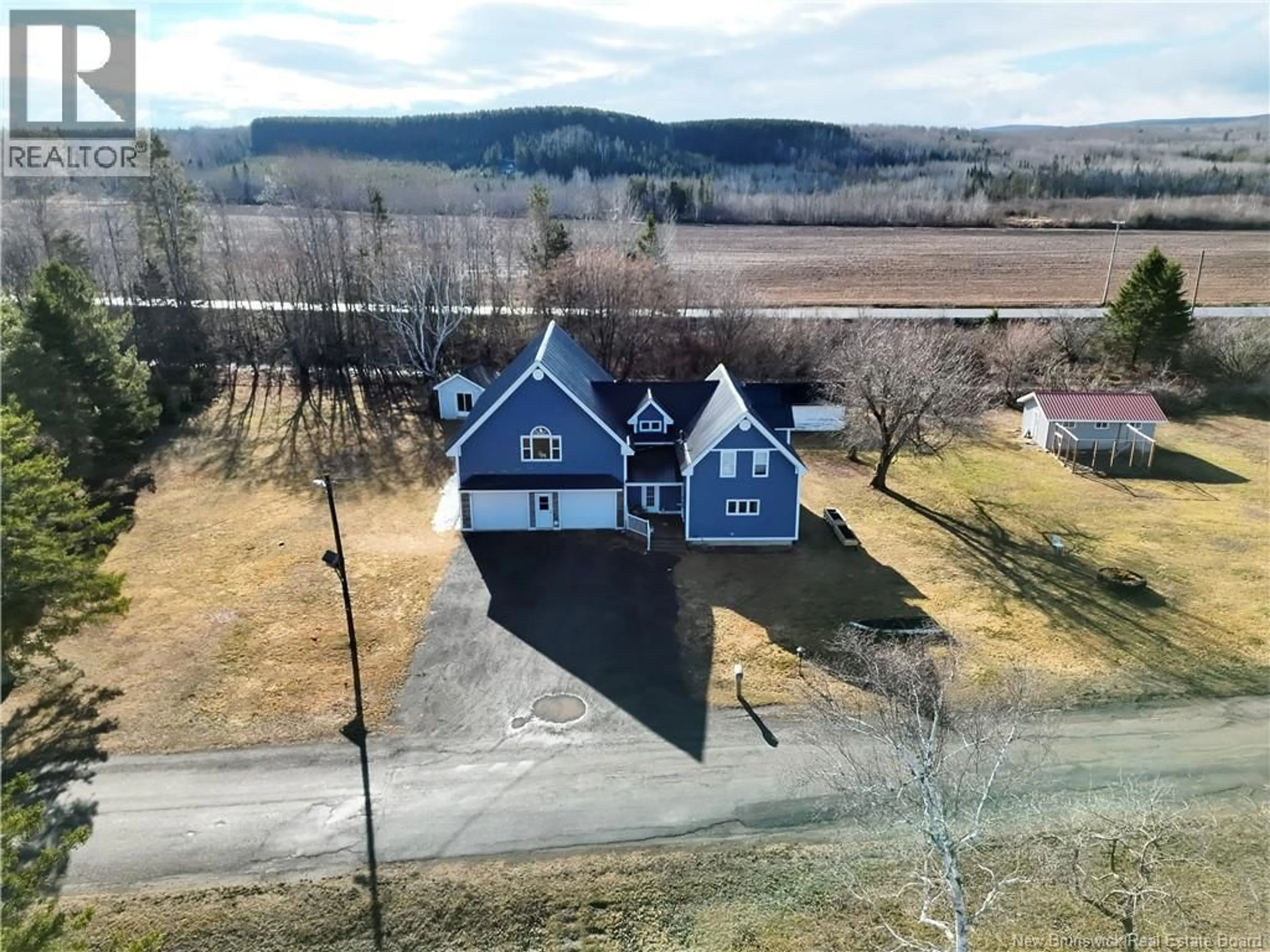 A pic from outside/outdoor area/front of a property/back of a property/a pic from drone, water/lake/river/ocean view for 36 OLD RIVER ROAD, Red Rapids New Brunswick E7H3H2