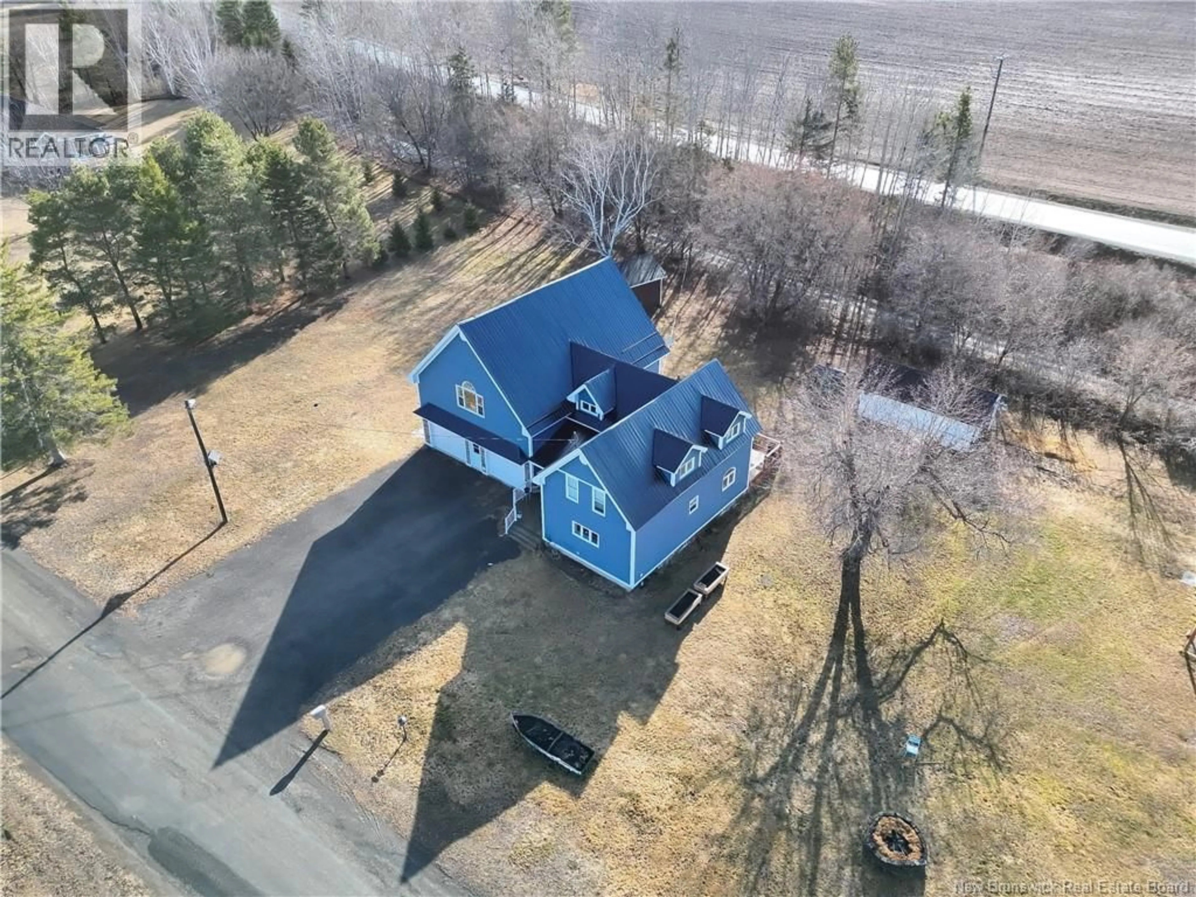 A pic from outside/outdoor area/front of a property/back of a property/a pic from drone, water/lake/river/ocean view for 36 OLD RIVER ROAD, Red Rapids New Brunswick E7H3H2