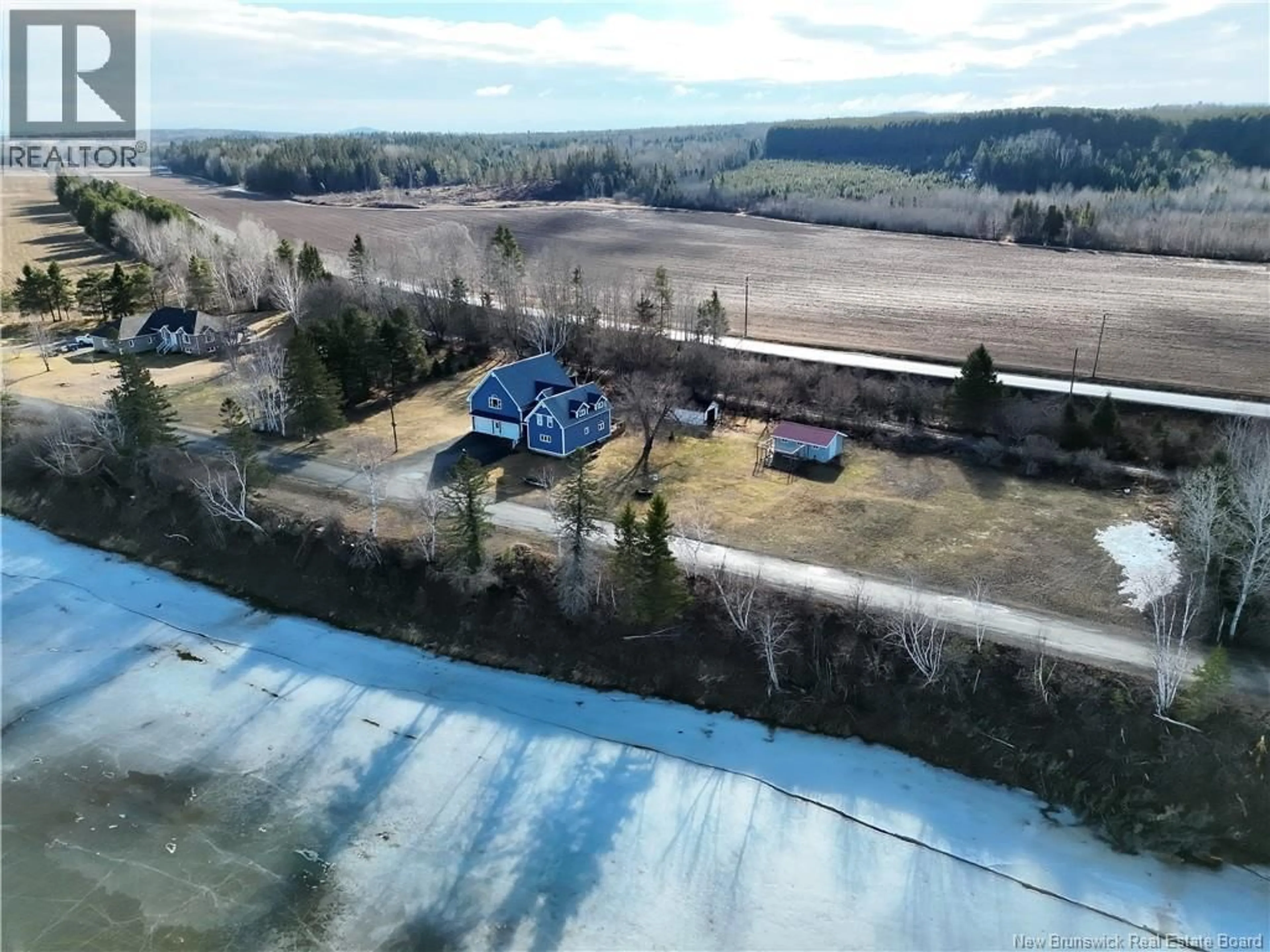 A pic from outside/outdoor area/front of a property/back of a property/a pic from drone, water/lake/river/ocean view for 36 OLD RIVER ROAD, Red Rapids New Brunswick E7H3H2