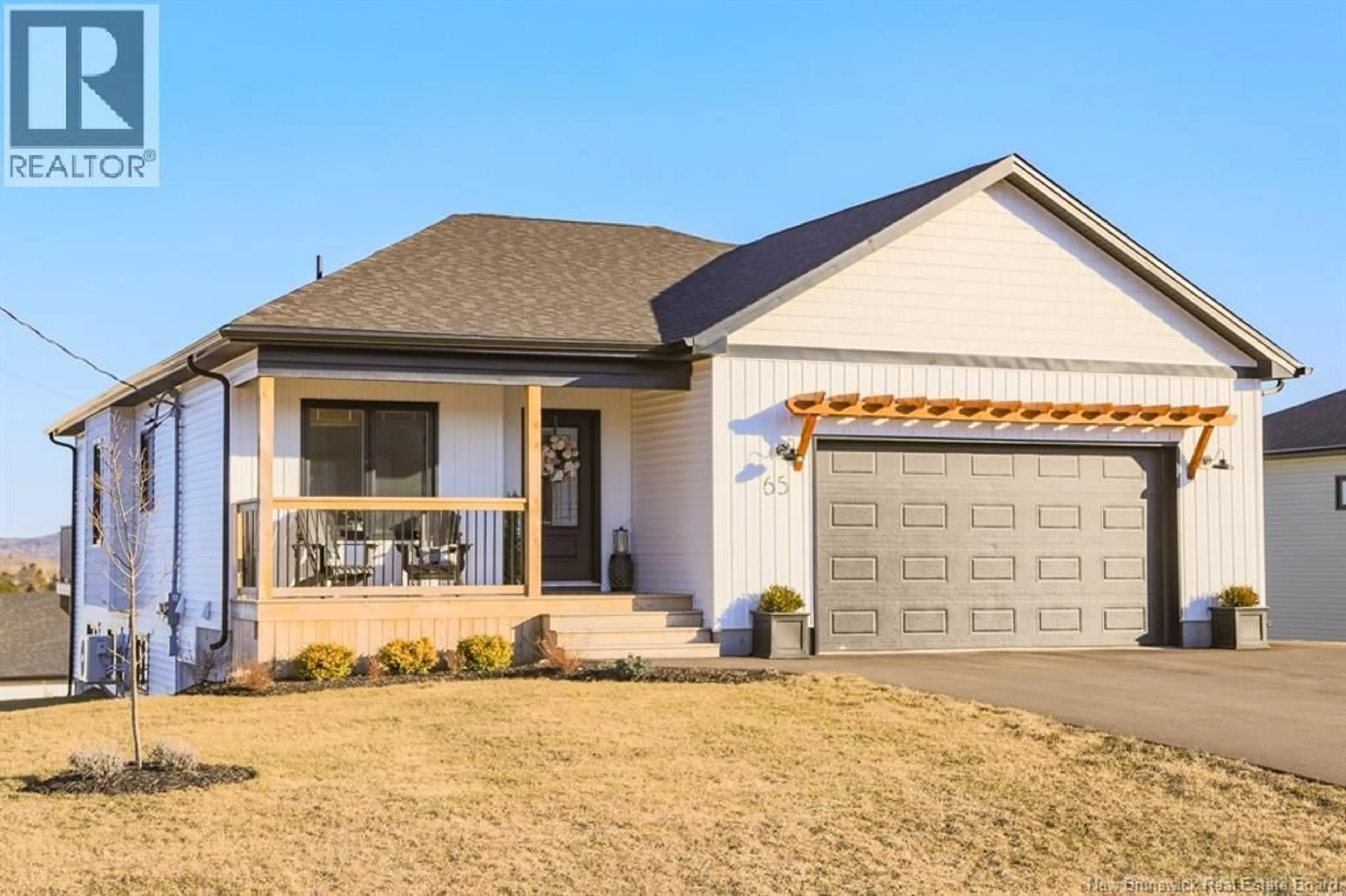 Home with vinyl exterior material, street for 65 MERLIN DRIVE, Quispamsis New Brunswick E2E0Y3