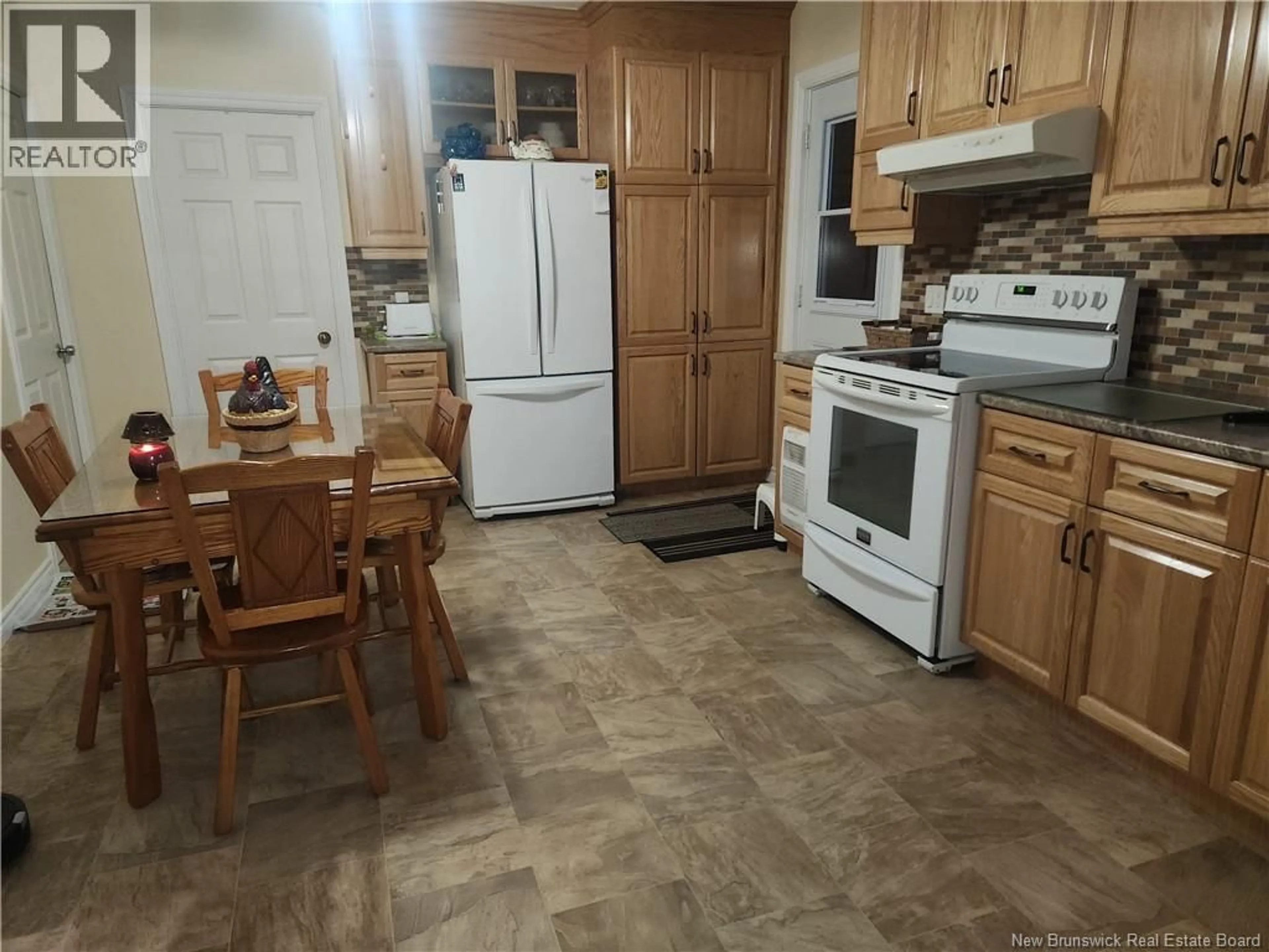 Standard kitchen, ceramic/tile floor for 66 ST-ANTOINE STREET, Saint-Léonard New Brunswick E7E1Z4