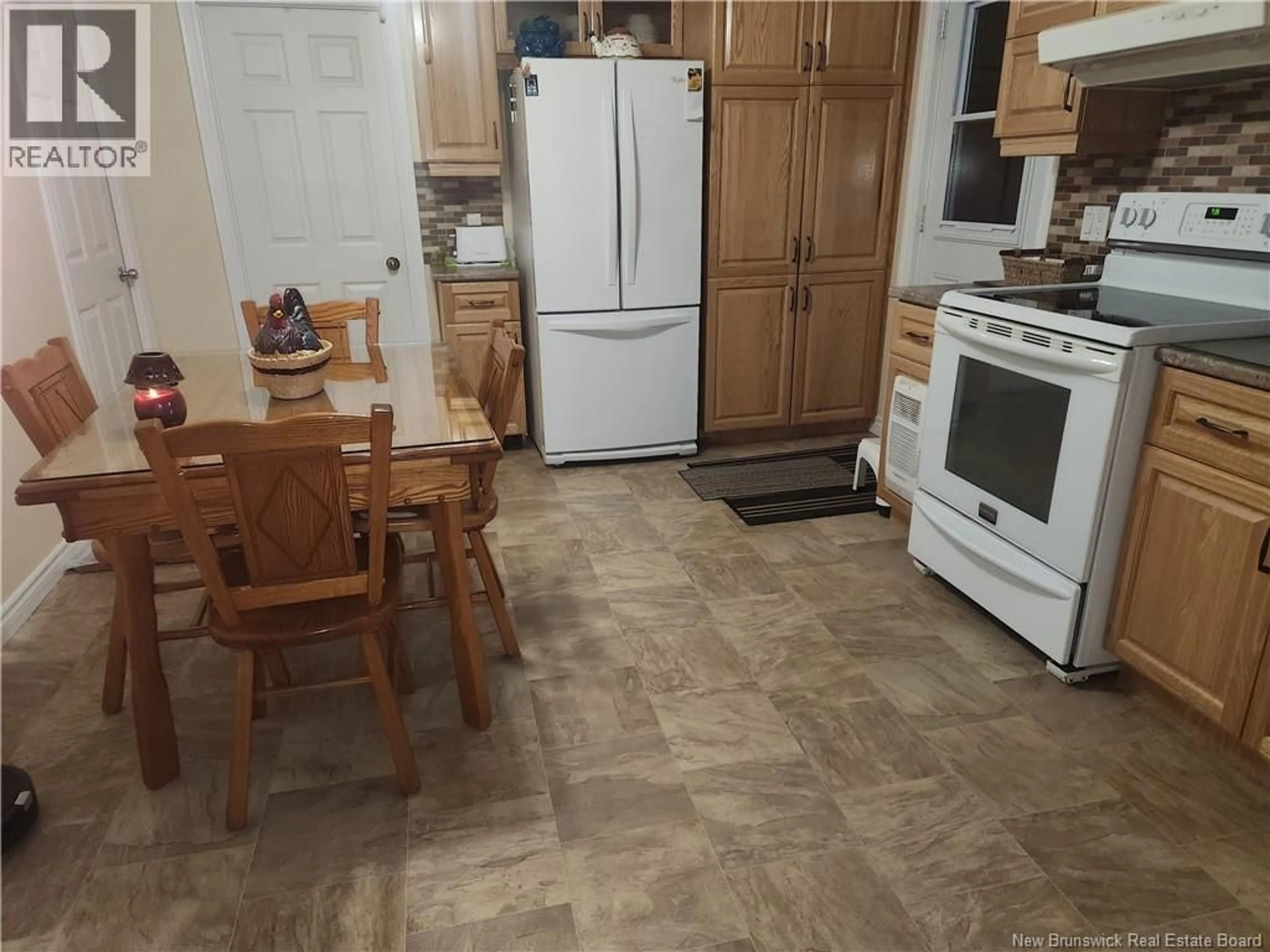 Standard kitchen, ceramic/tile floor for 66 ST-ANTOINE STREET, Saint-Léonard New Brunswick E7E1Z4