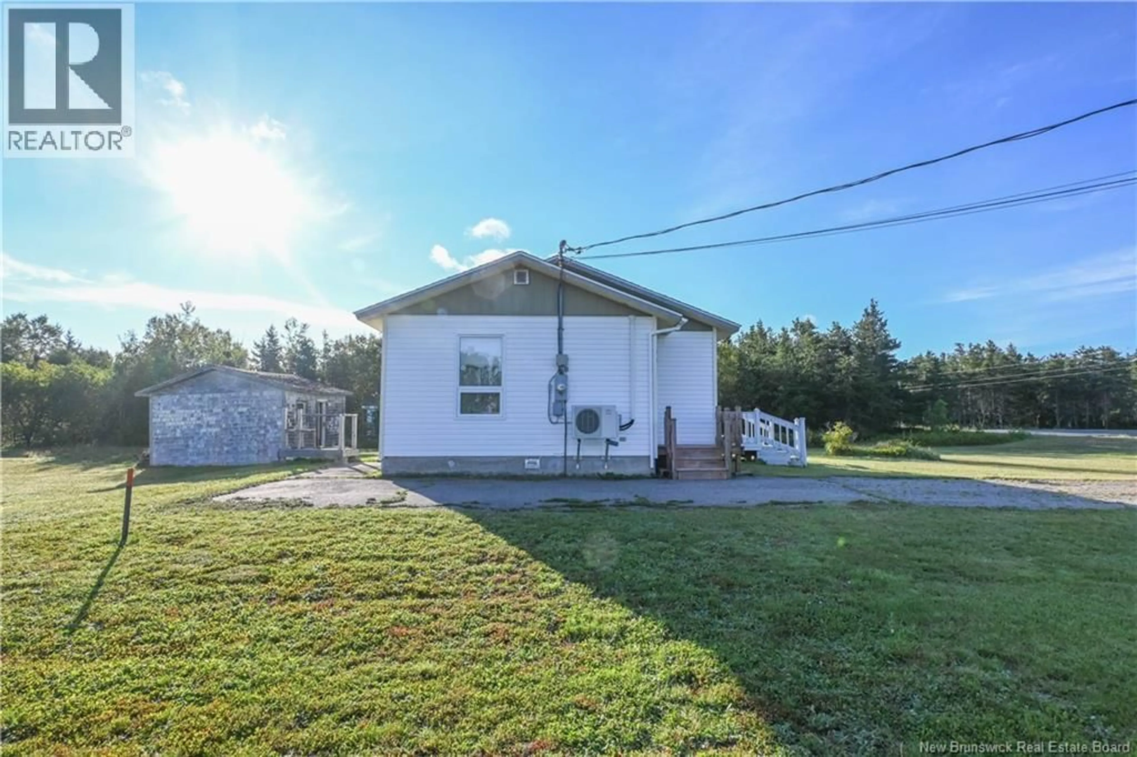 A pic from outside/outdoor area/front of a property/back of a property/a pic from drone, street for 10631 ROUTE 145, Pokesudie New Brunswick E1W5S9