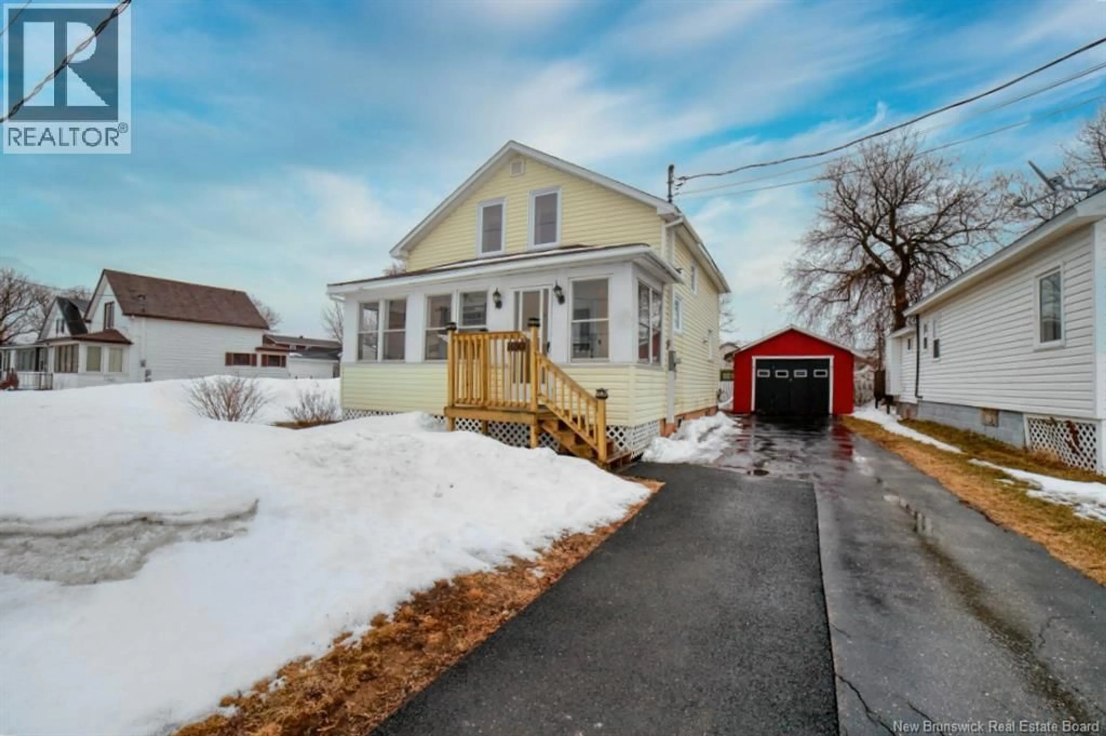 A pic from outside/outdoor area/front of a property/back of a property/a pic from drone, street for 1130 MODEL, Bathurst New Brunswick E2A2C6