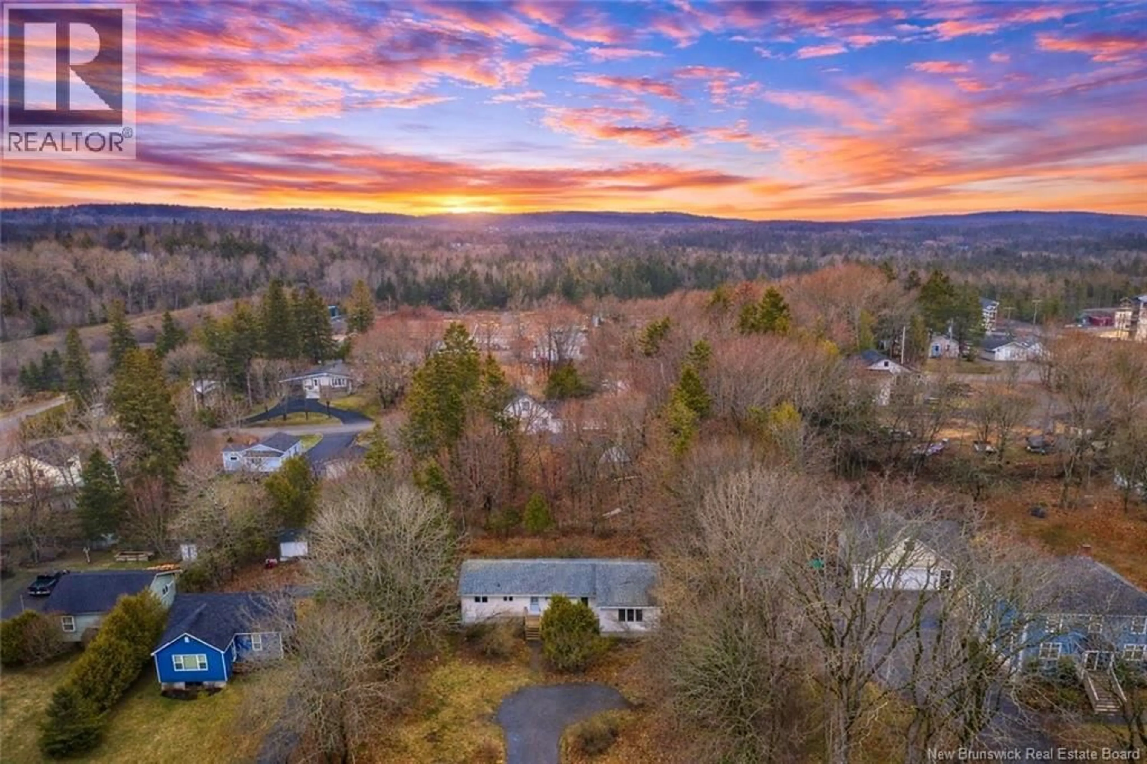 A pic from outside/outdoor area/front of a property/back of a property/a pic from drone, unknown for 9 CLARK ROAD, Rothesay New Brunswick E2E2G8