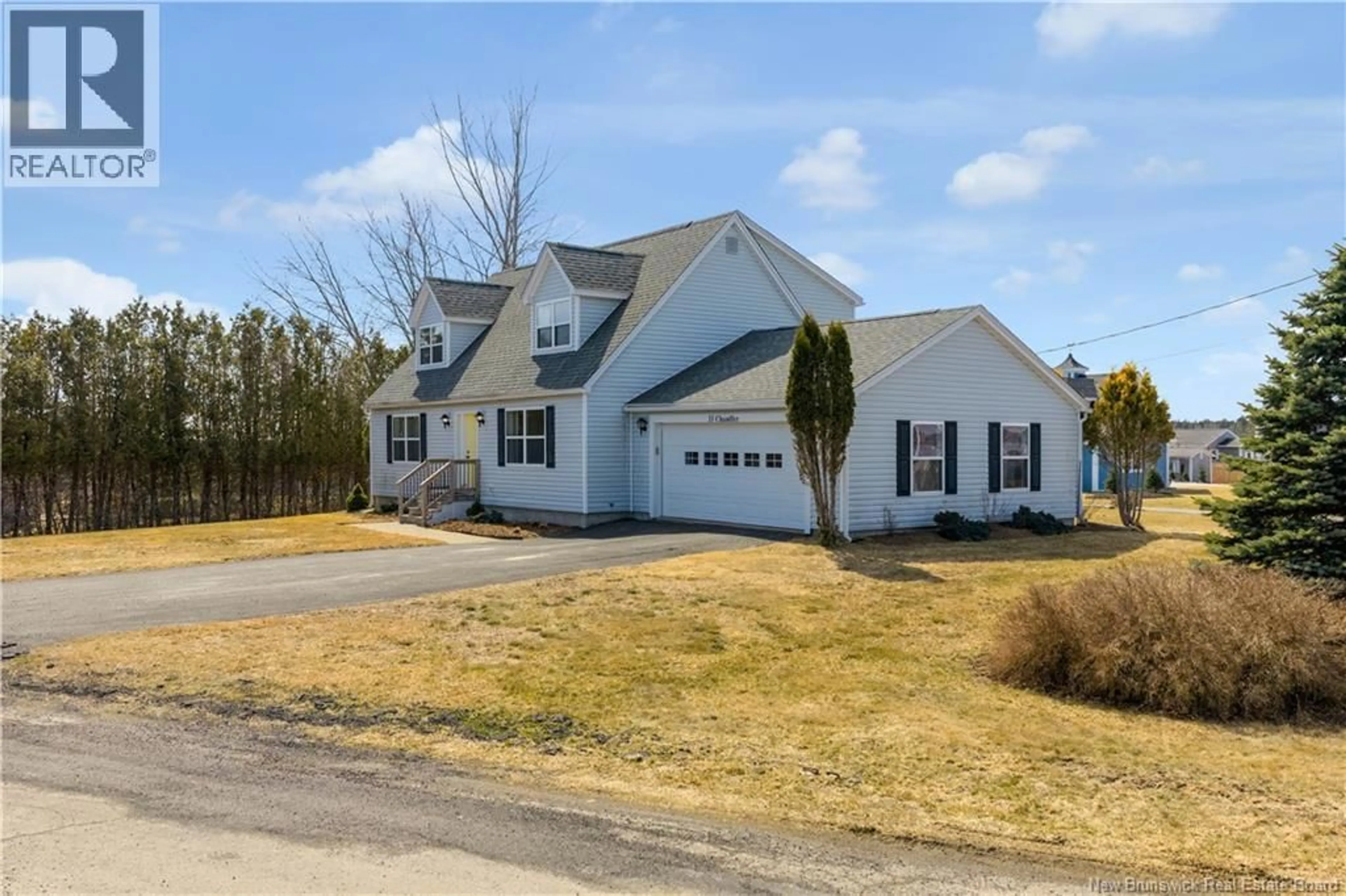 Home with vinyl exterior material, street for 33 CHANDLER ROAD, Saint Andrews New Brunswick E5B2H4