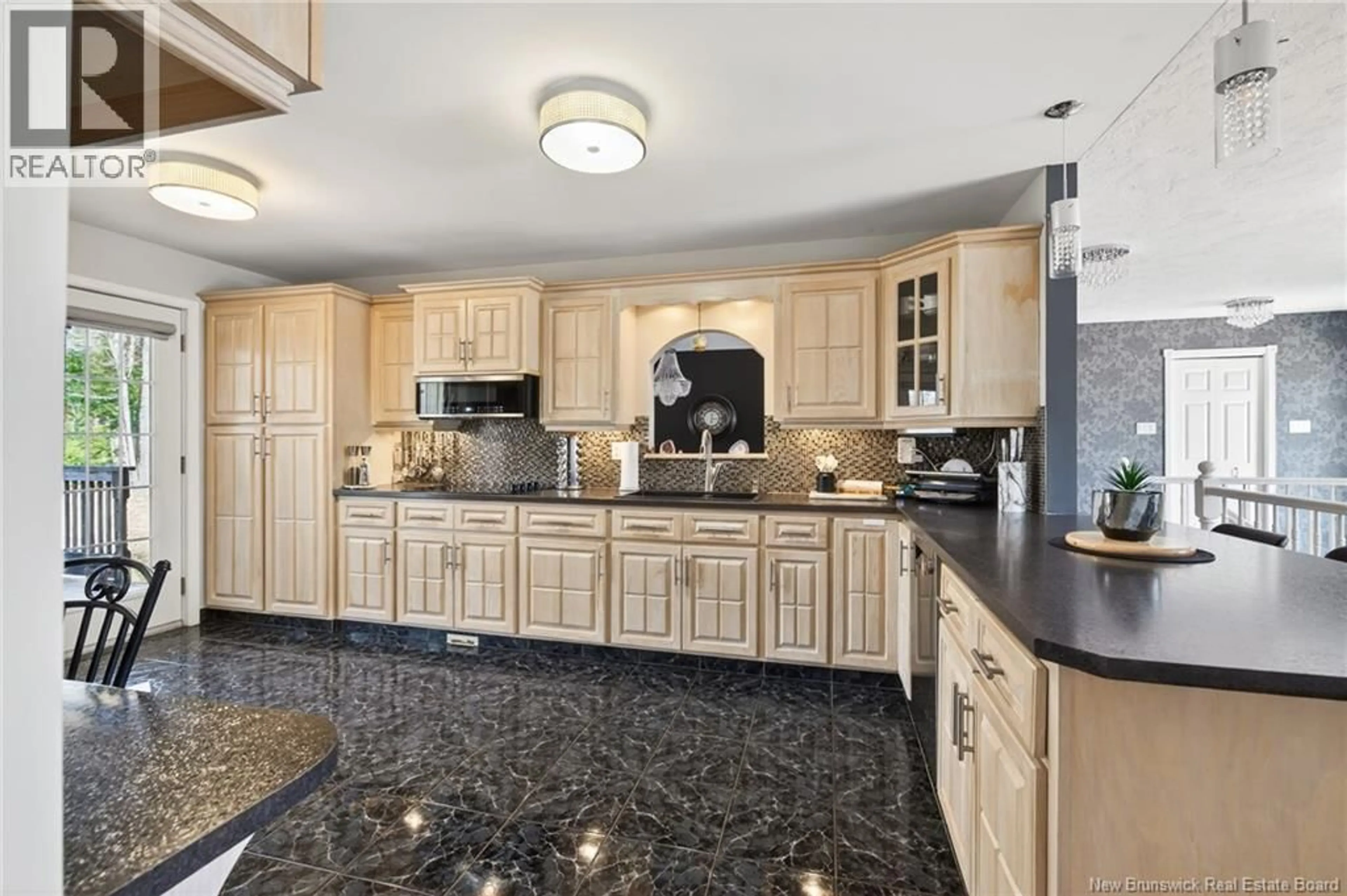 Open concept kitchen, ceramic/tile floor for 38 SHEILA, Berry Mills New Brunswick E1G4X4