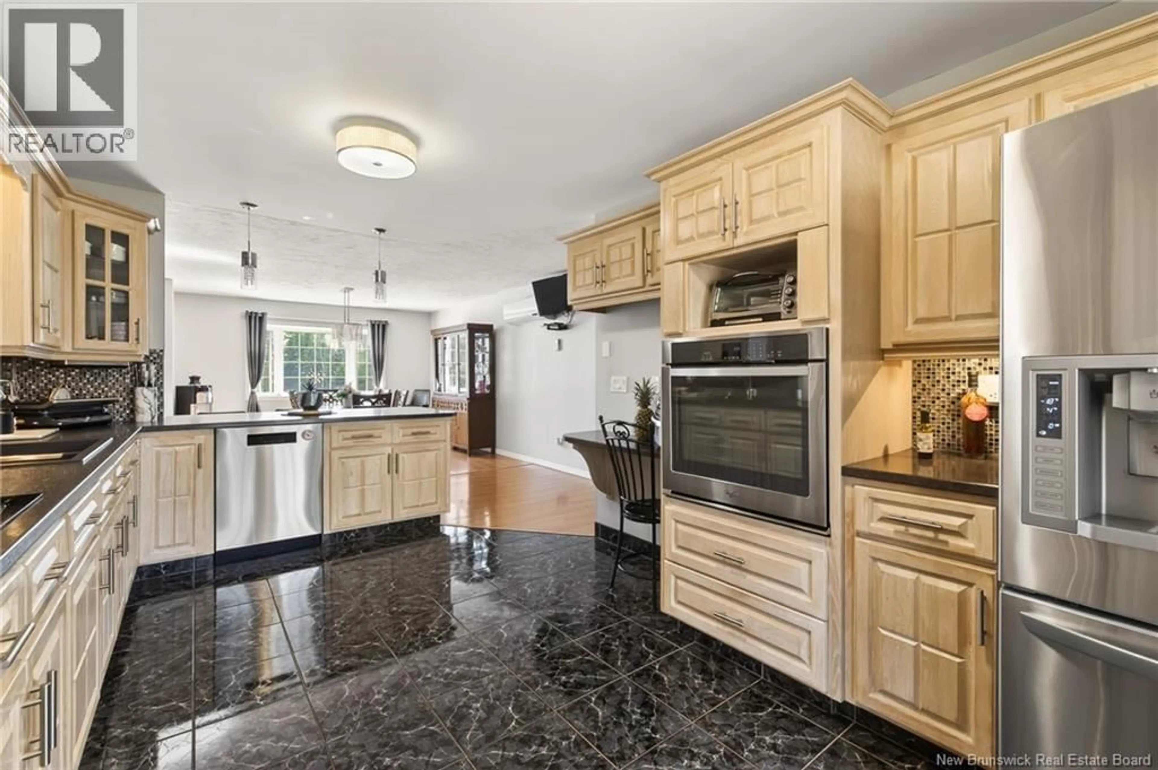 Open concept kitchen, ceramic/tile floor for 38 SHEILA, Berry Mills New Brunswick E1G4X4