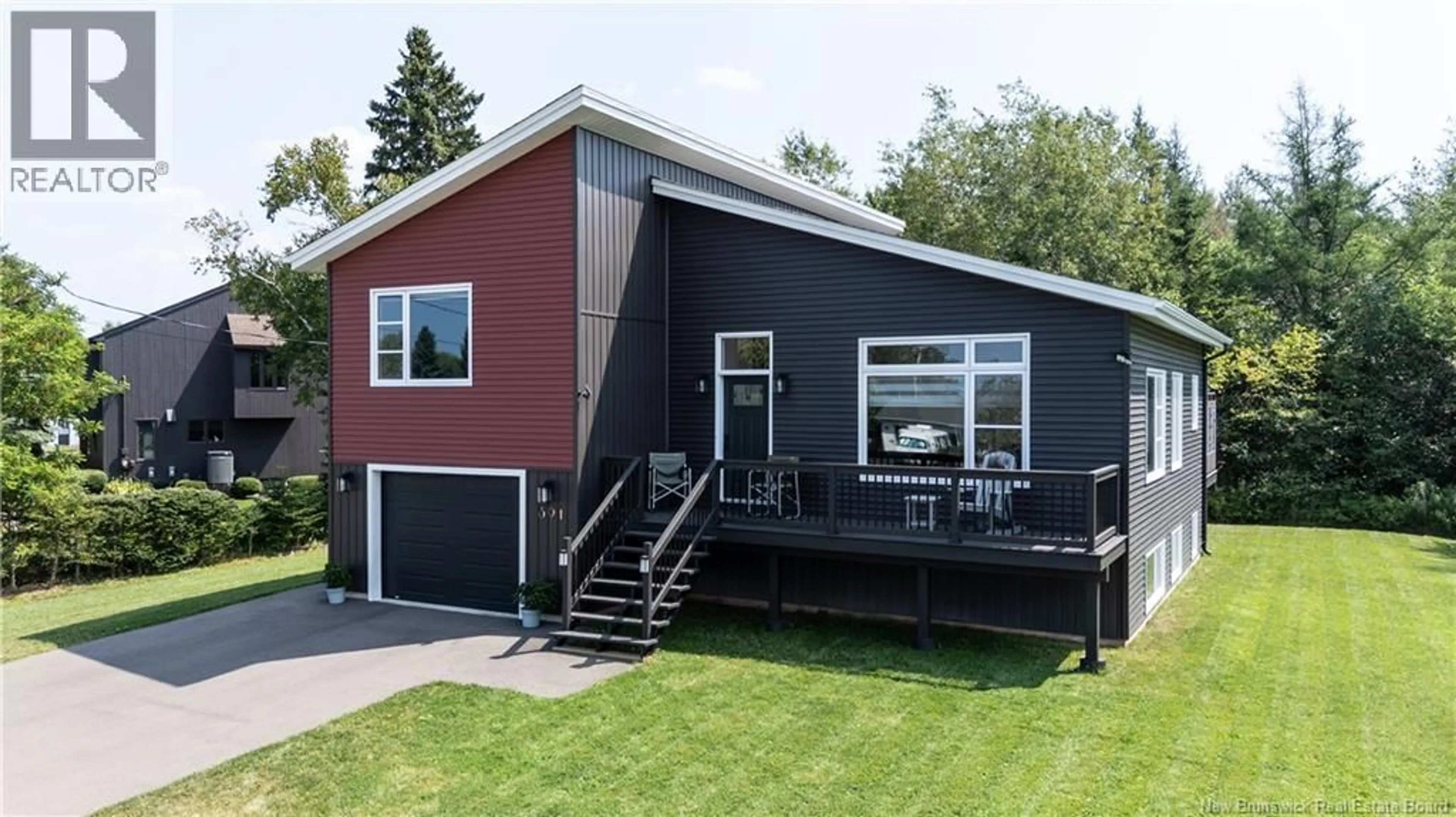 Home with vinyl exterior material, street for 391 RUE BREAUX BRIDGE, Shediac New Brunswick E4P2M4