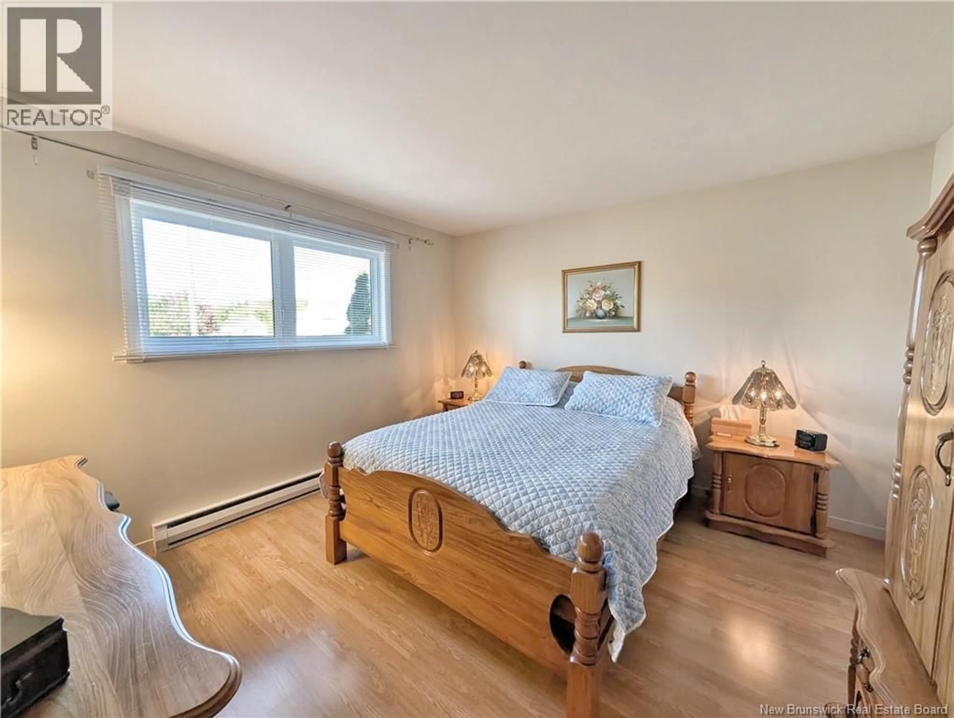 Bedroom with bed, wood/laminate floor for 1794 RUE CHÂTILLON, Maisonnette New Brunswick E8N1Y5