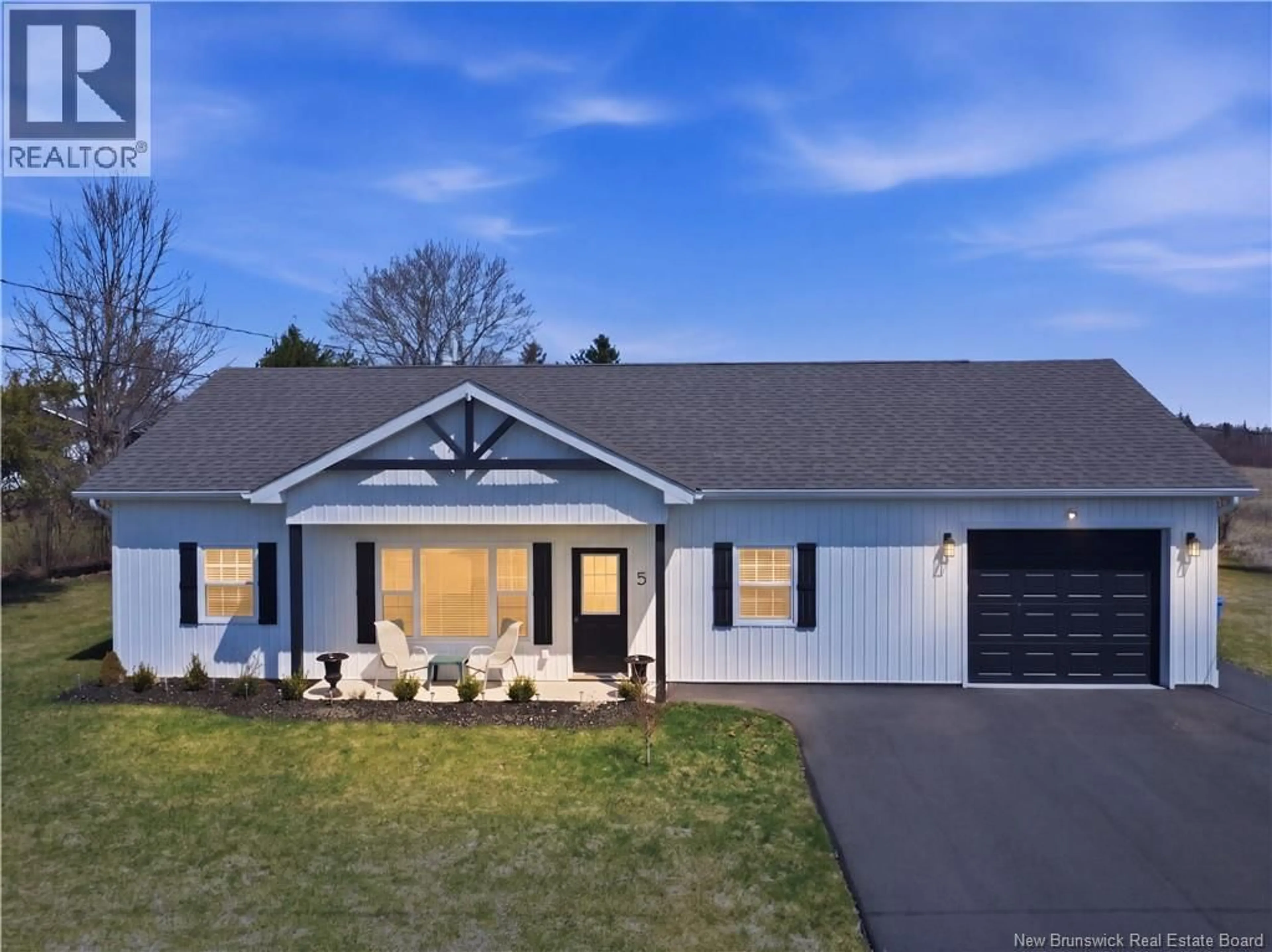 Home with vinyl exterior material, street for 5 HUNWICKS STREET, Salisbury New Brunswick E4J0E3