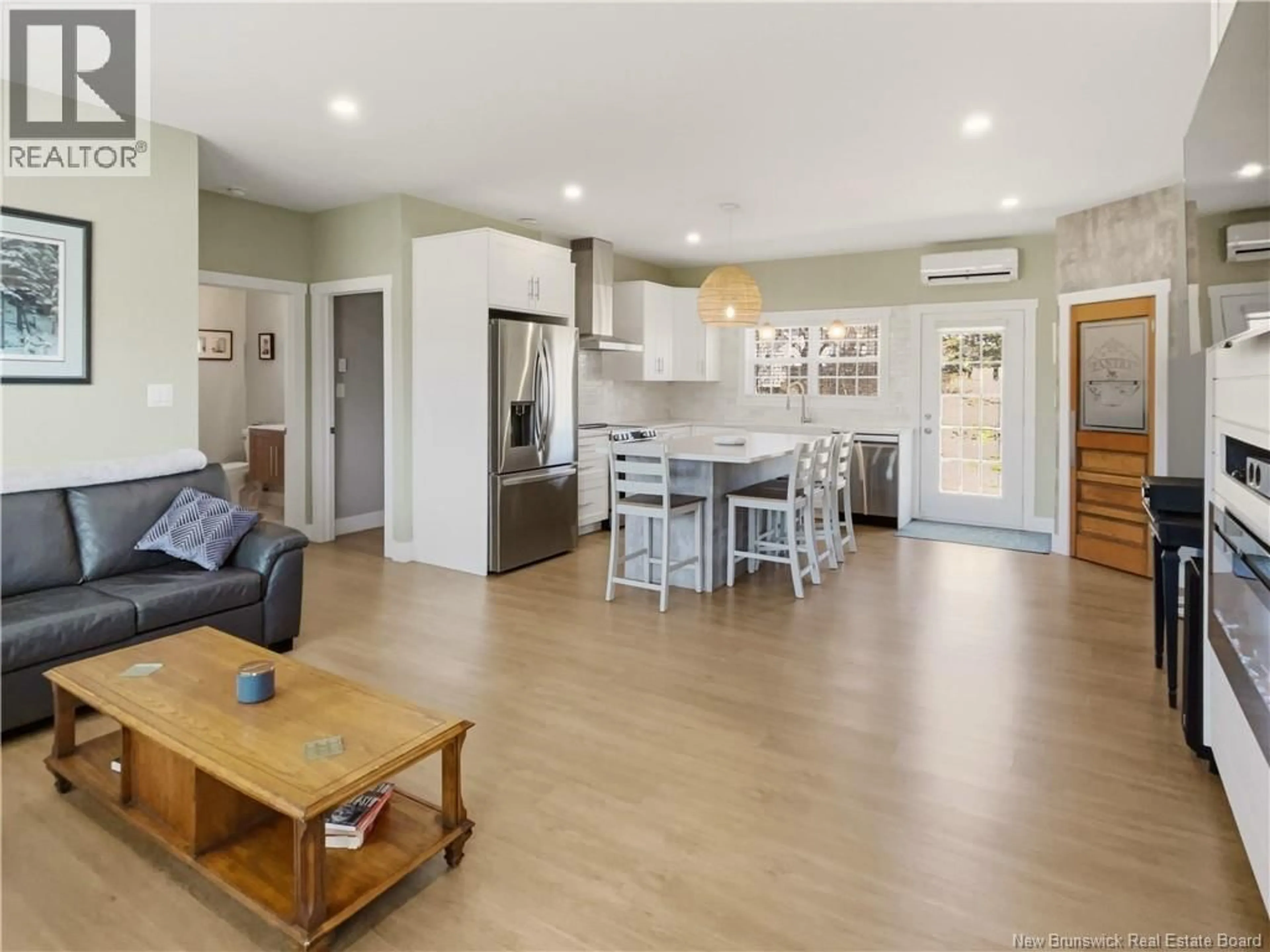 Open concept kitchen, wood/laminate floor for 5 HUNWICKS STREET, Salisbury New Brunswick E4J0E3