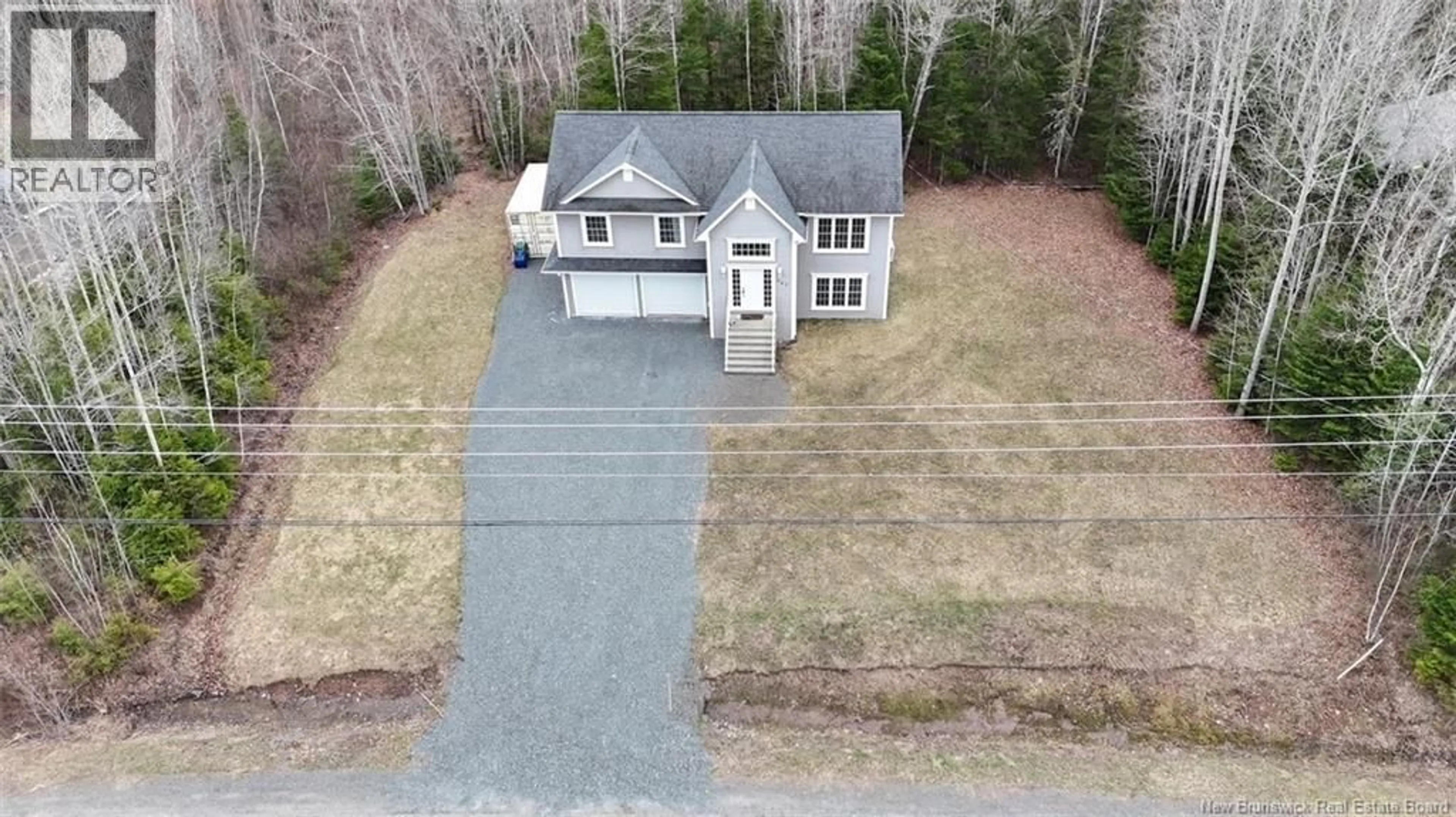 A pic from outside/outdoor area/front of a property/back of a property/a pic from drone, street for 447 WHITTAKER ROAD, Beaver Dam New Brunswick E3B7W9