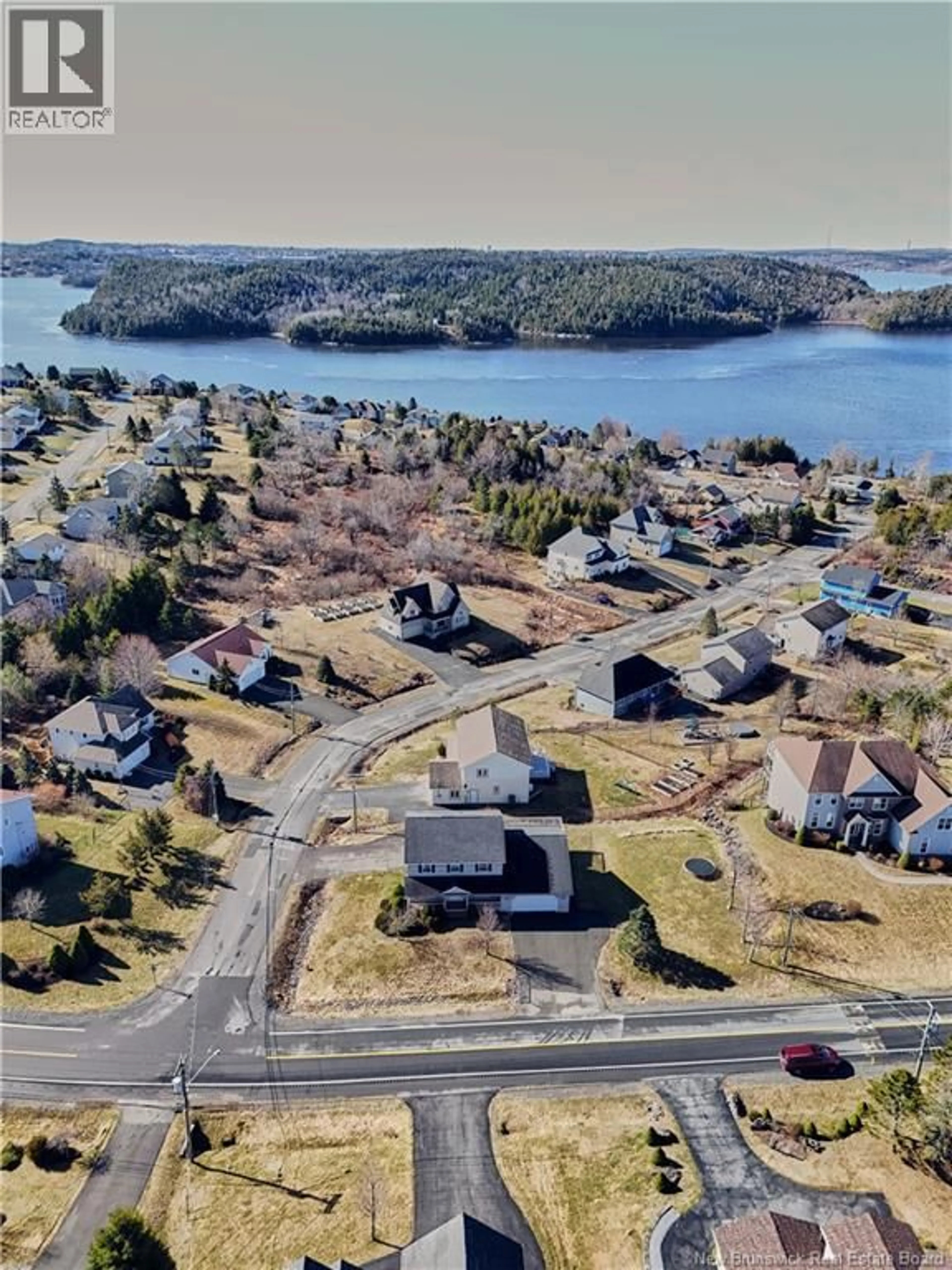 A pic from outside/outdoor area/front of a property/back of a property/a pic from drone, water/lake/river/ocean view for 77 CEDARWOOD DRIVE, Saint John New Brunswick E2K5P5
