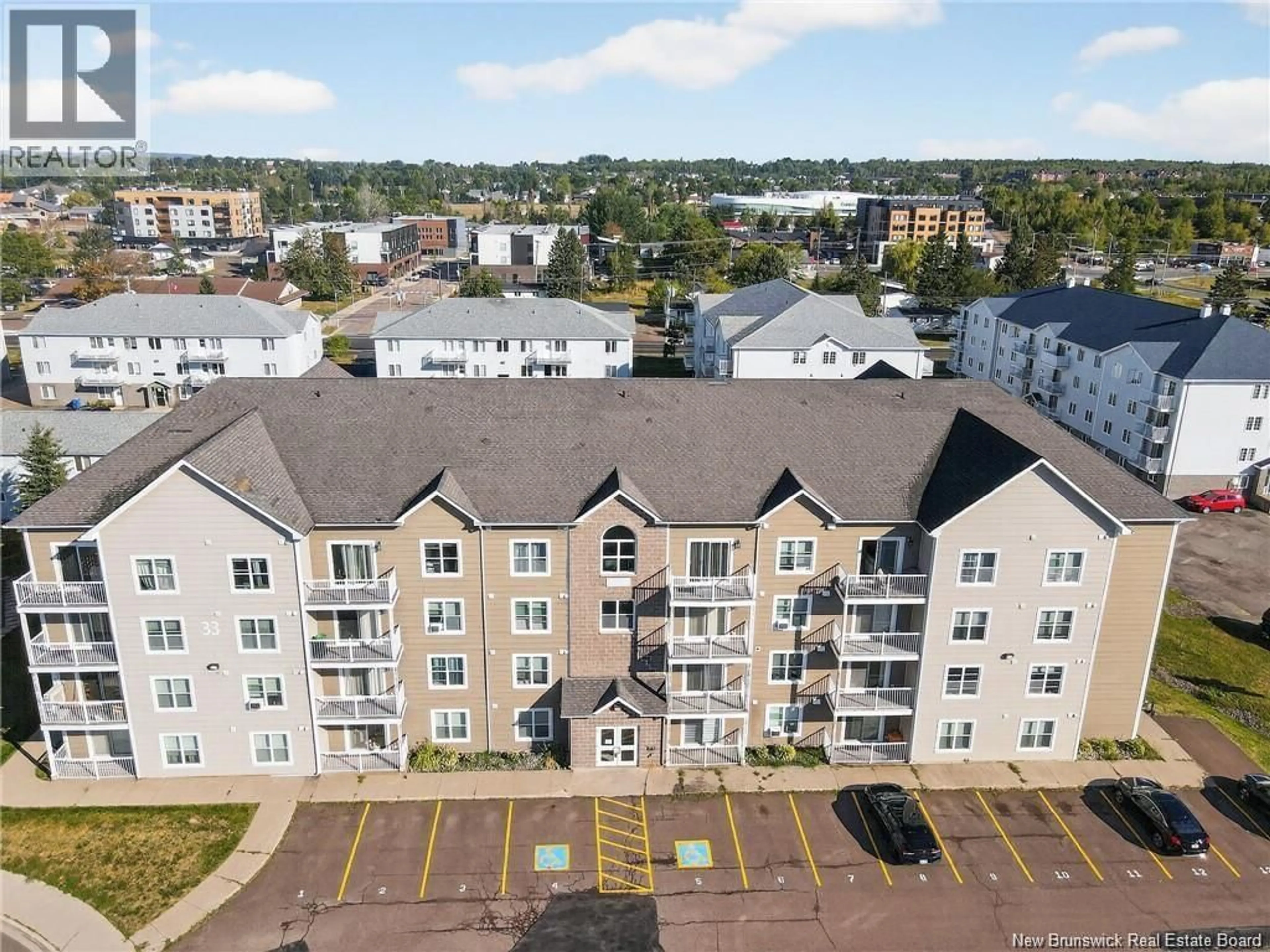 A pic from outside/outdoor area/front of a property/back of a property/a pic from drone, city buildings view from balcony for 407 - 33 SIFROI STREET, Dieppe New Brunswick E1A5T1