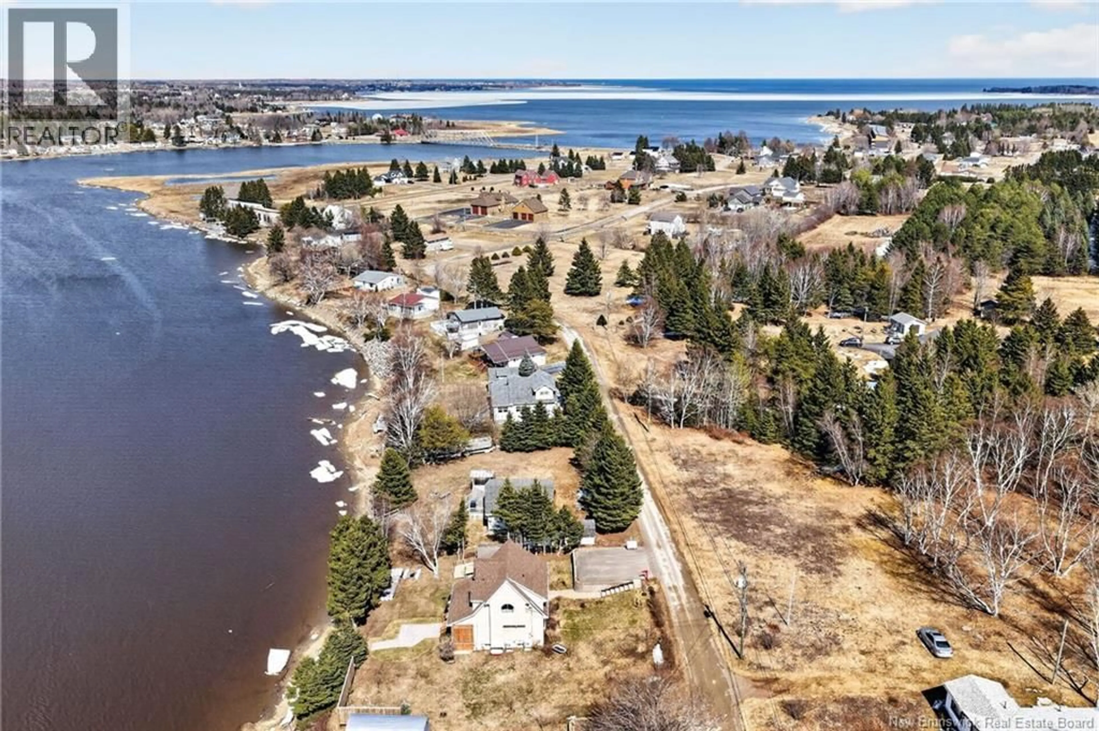 A pic from outside/outdoor area/front of a property/back of a property/a pic from drone, water/lake/river/ocean view for 16 DES CERISIERS, Shediac Bridge New Brunswick E4R1G7